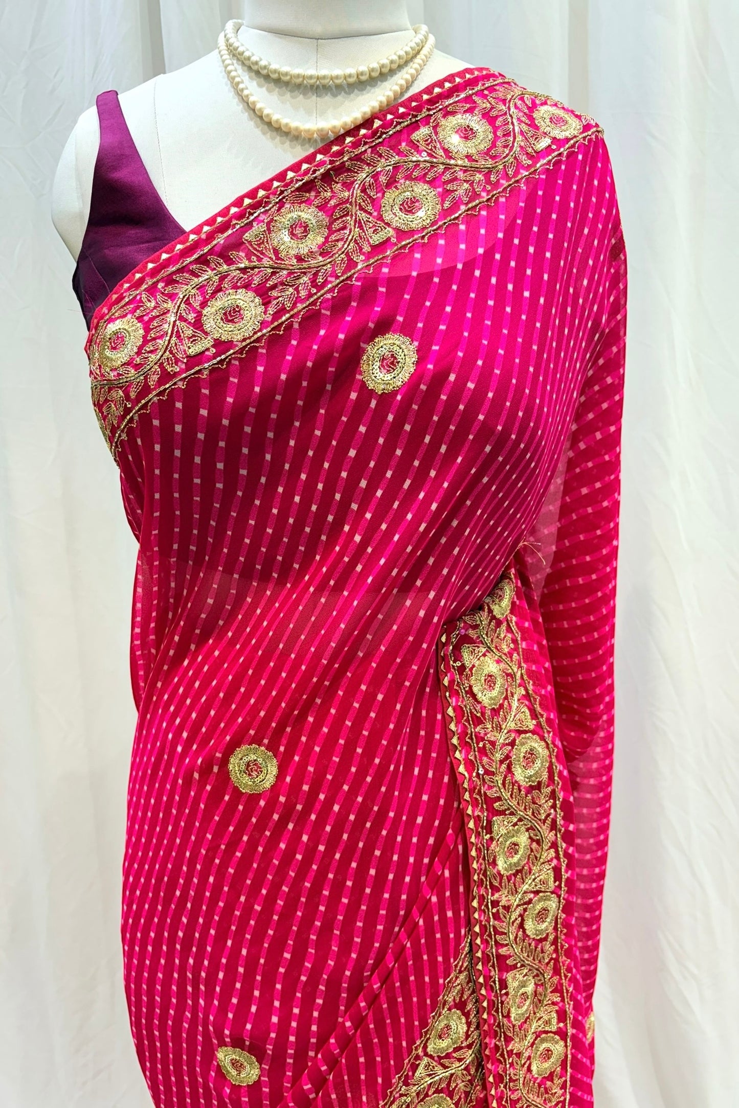 Pink motra zari georgette saree