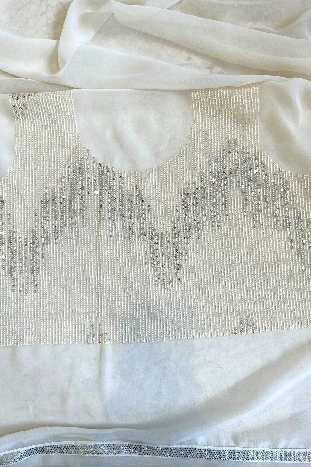 Off white sequins threadwork georgette saree