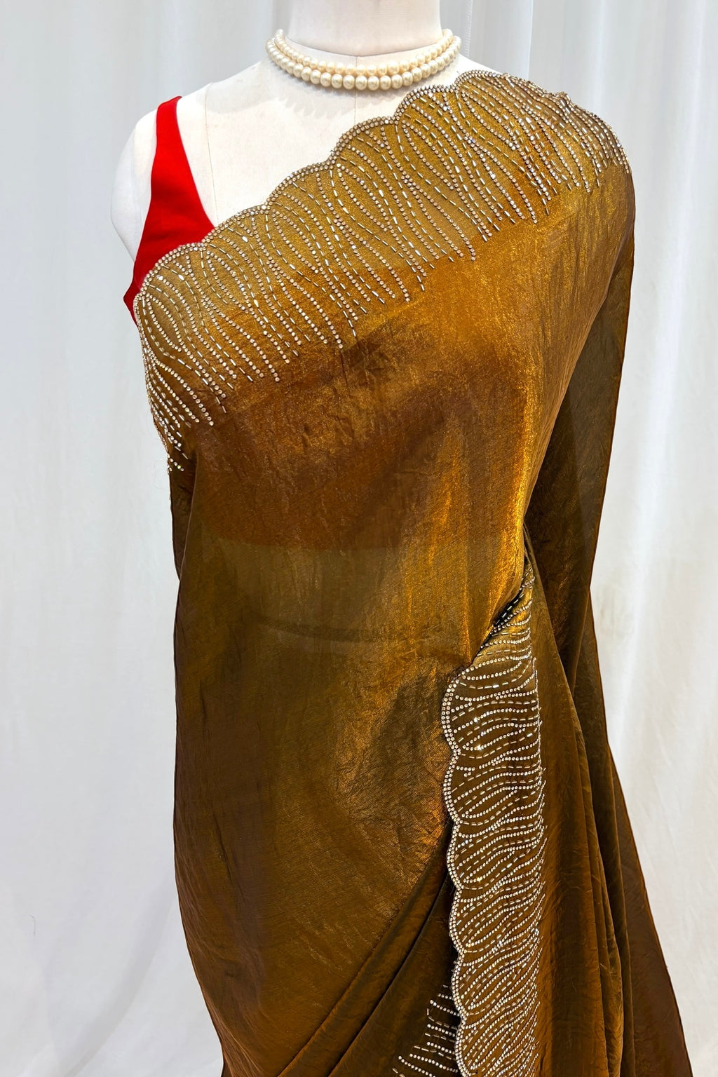 Golden fendy embellished saree