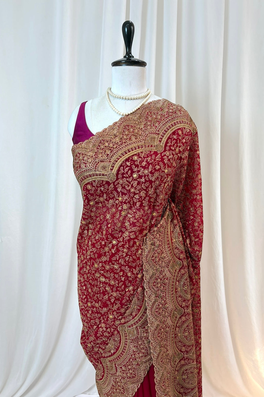 Crimson embroidered saree