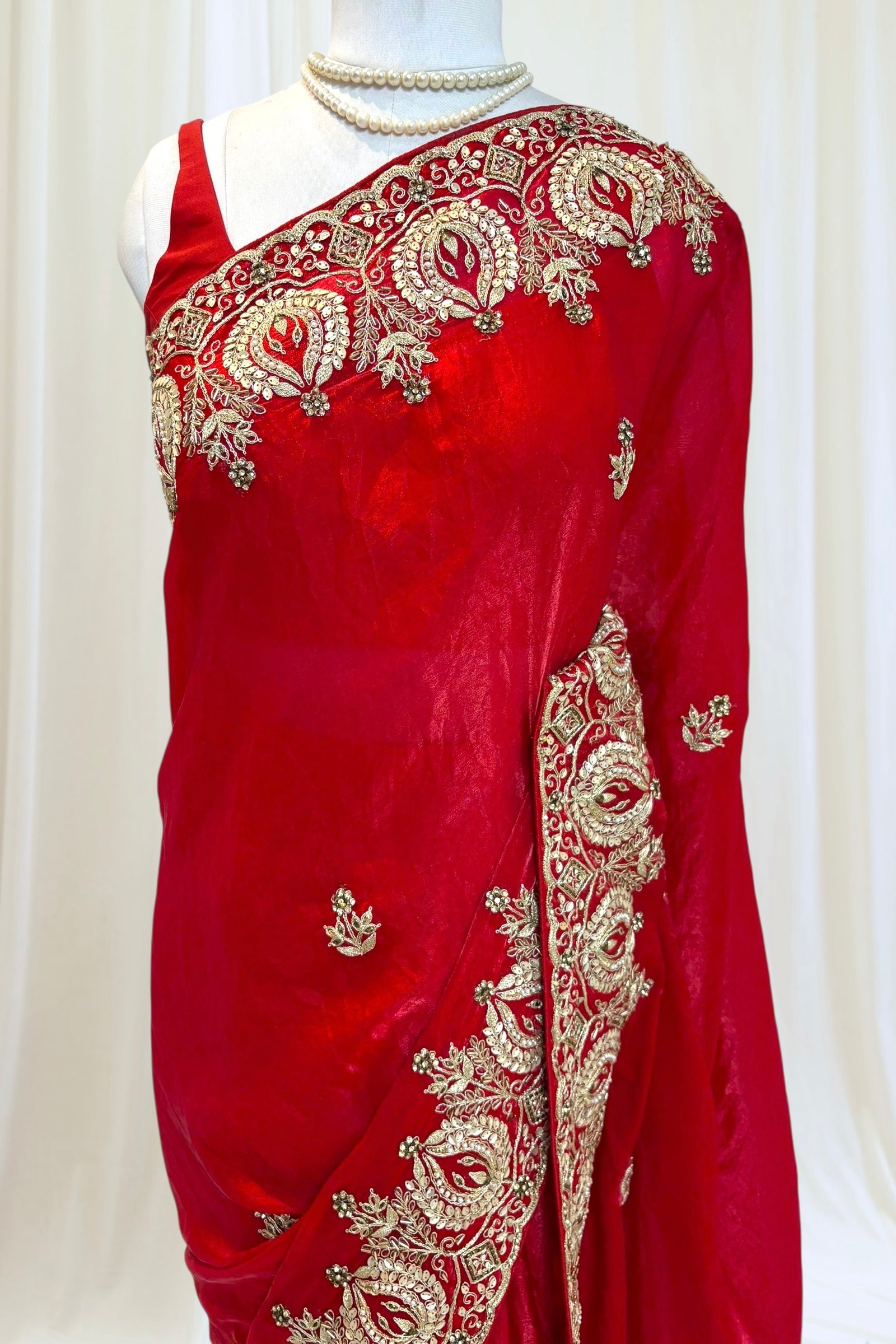 Red fendy satin embellished saree