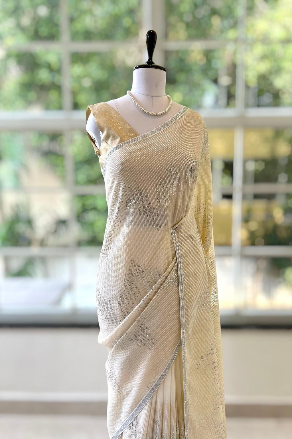 Off white sequins threadwork georgette saree