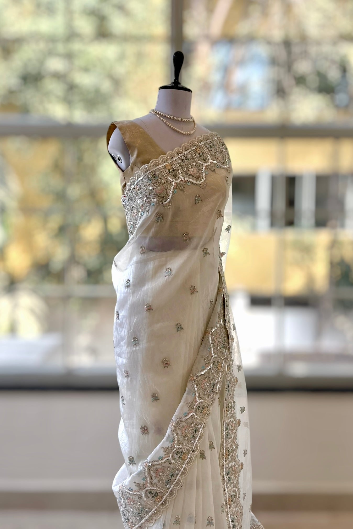 White organza sequins embellished saree
