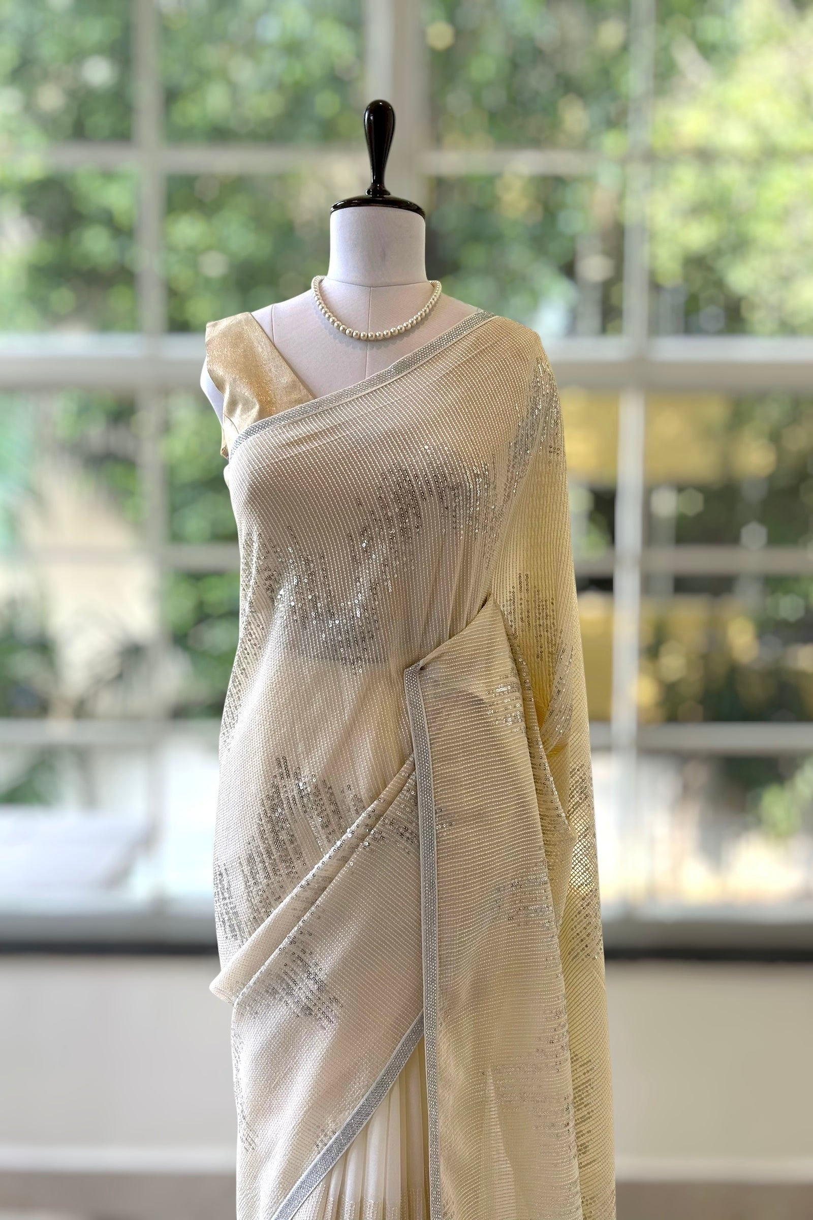 Off white sequins threadwork georgette saree