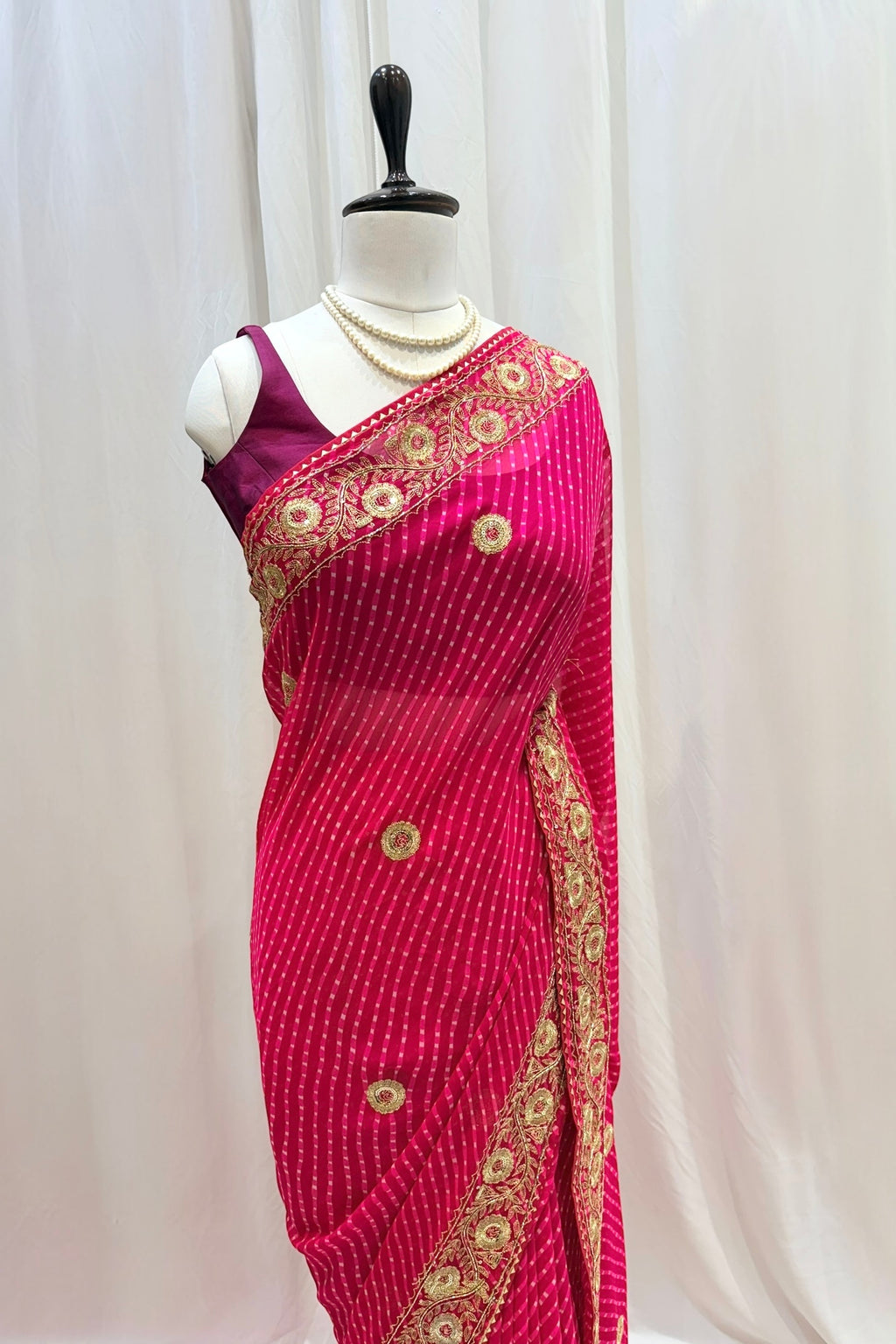 Pink motra zari georgette saree