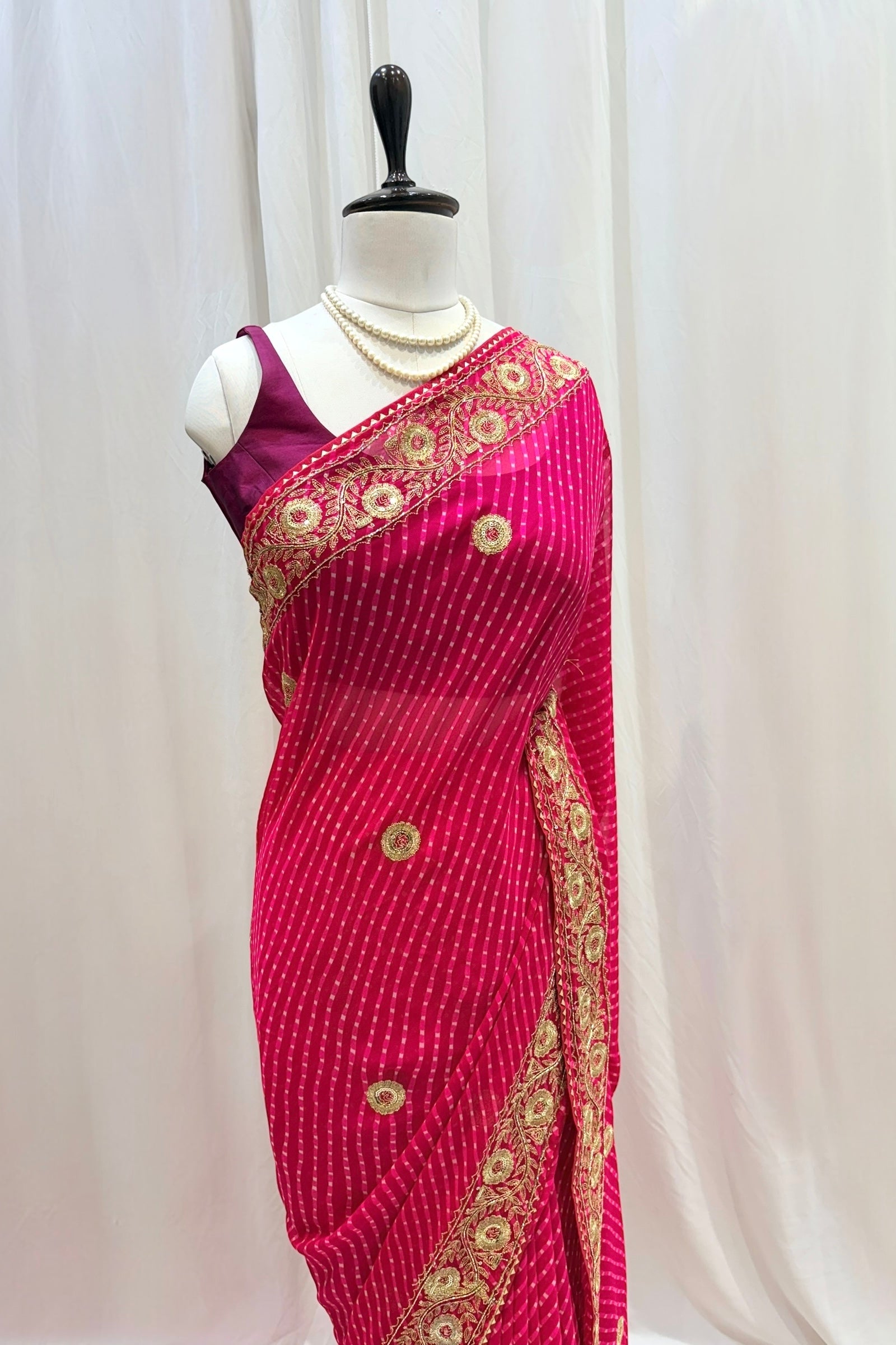 Pink motra zari georgette saree