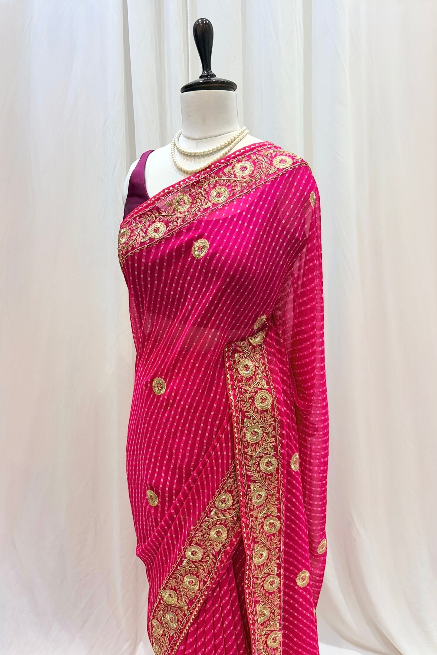 Pink motra zari georgette saree