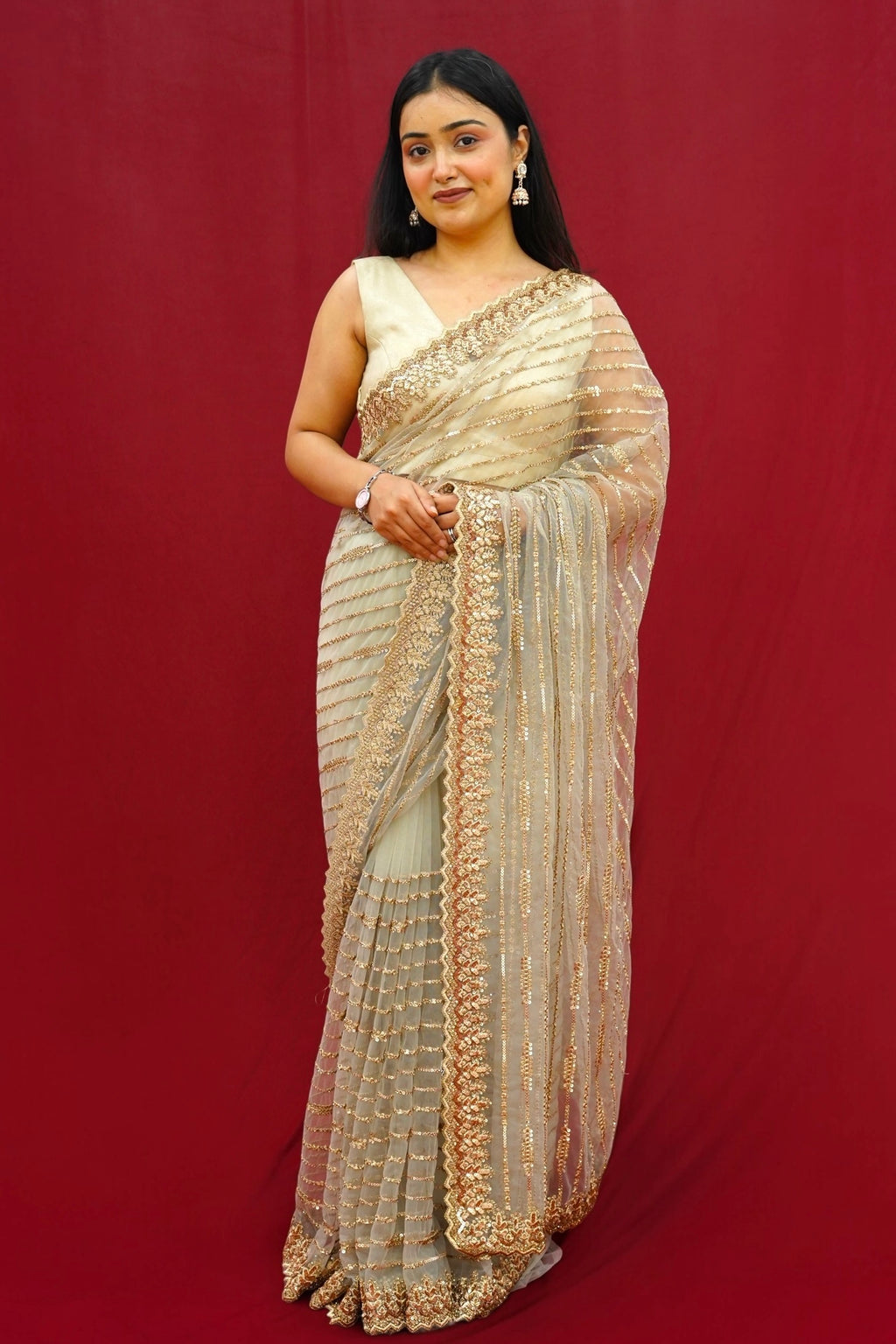 Golden sequins soft net saree - Striped