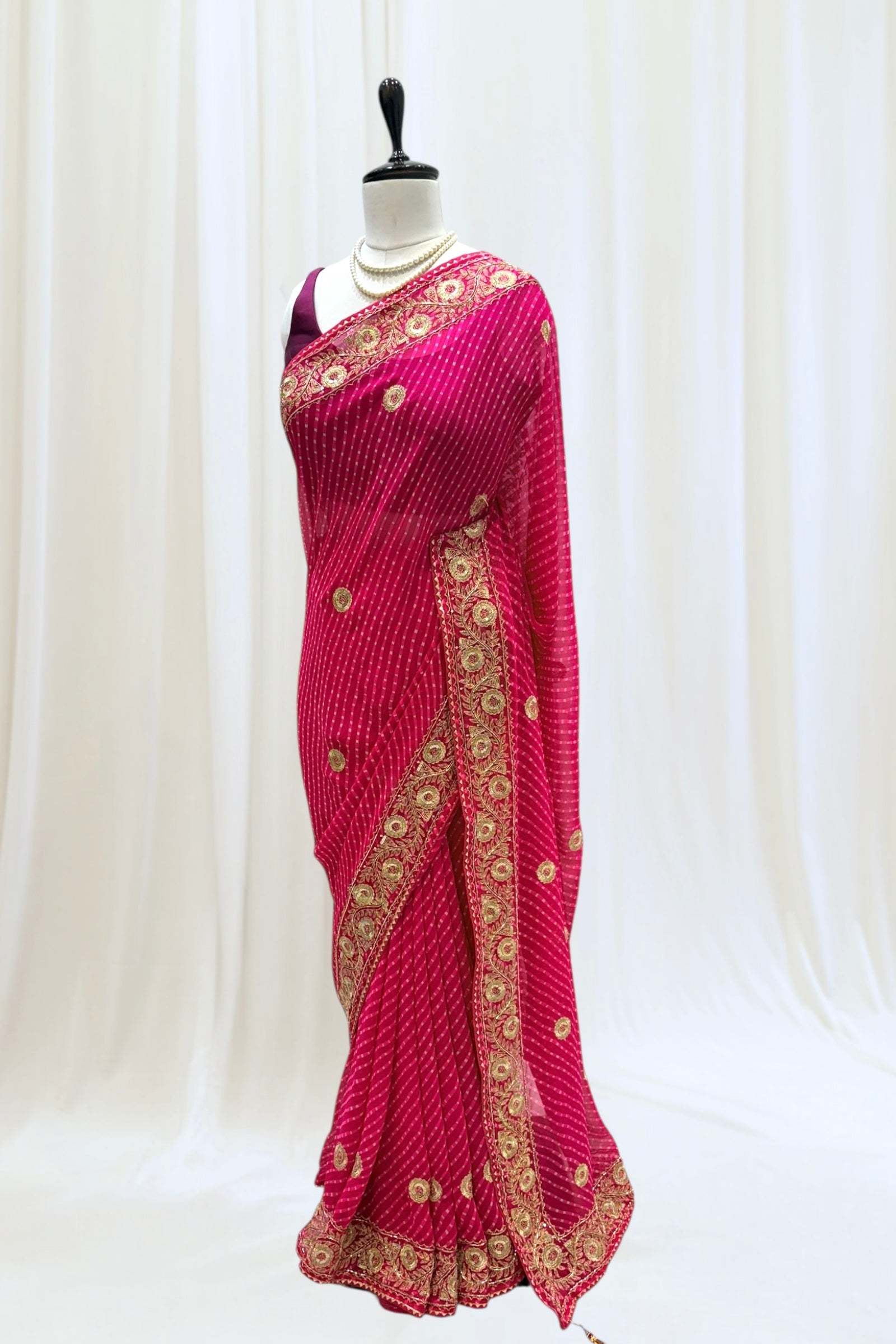 Pink motra zari georgette saree