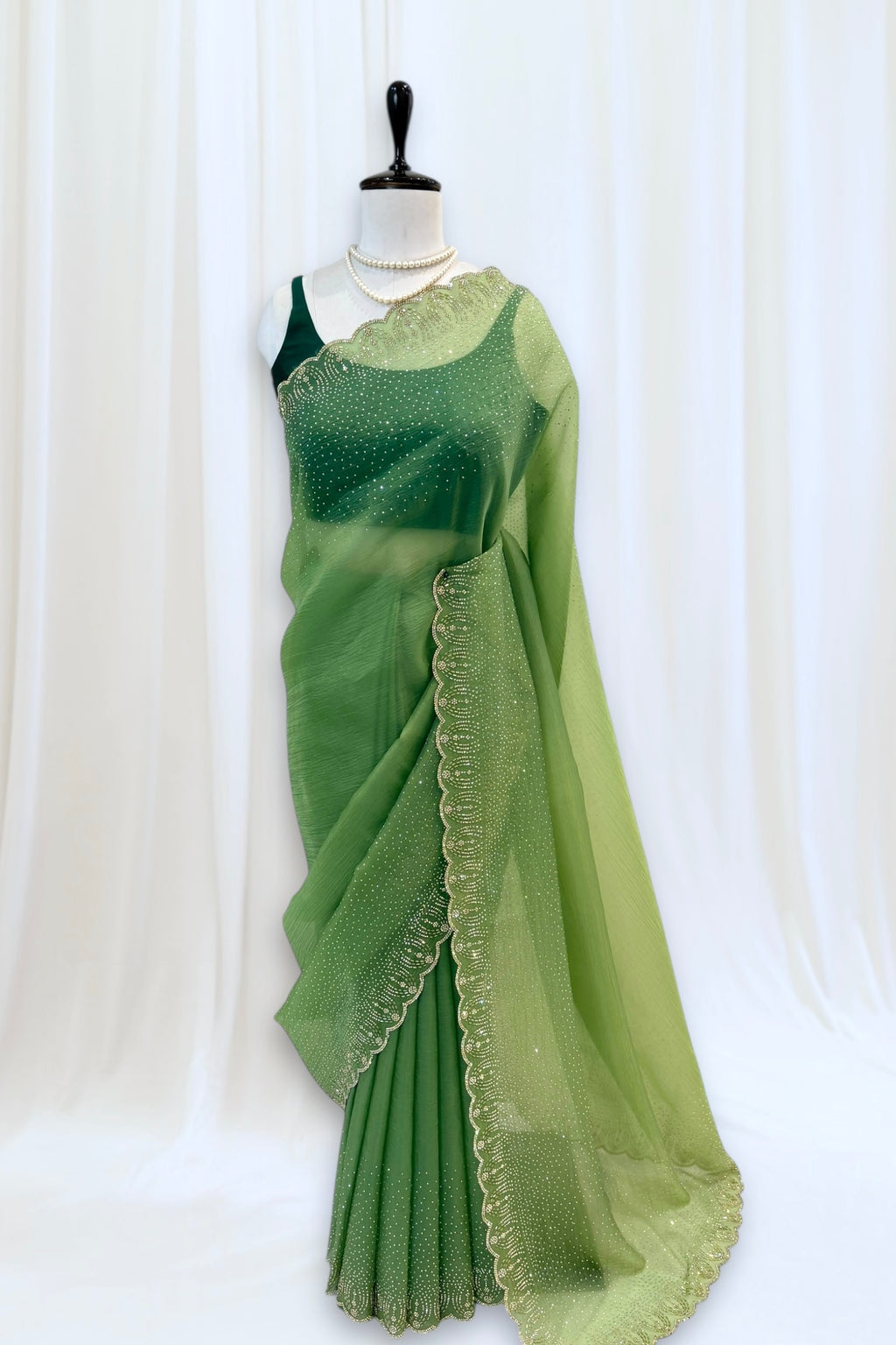 Green organza embellished saree