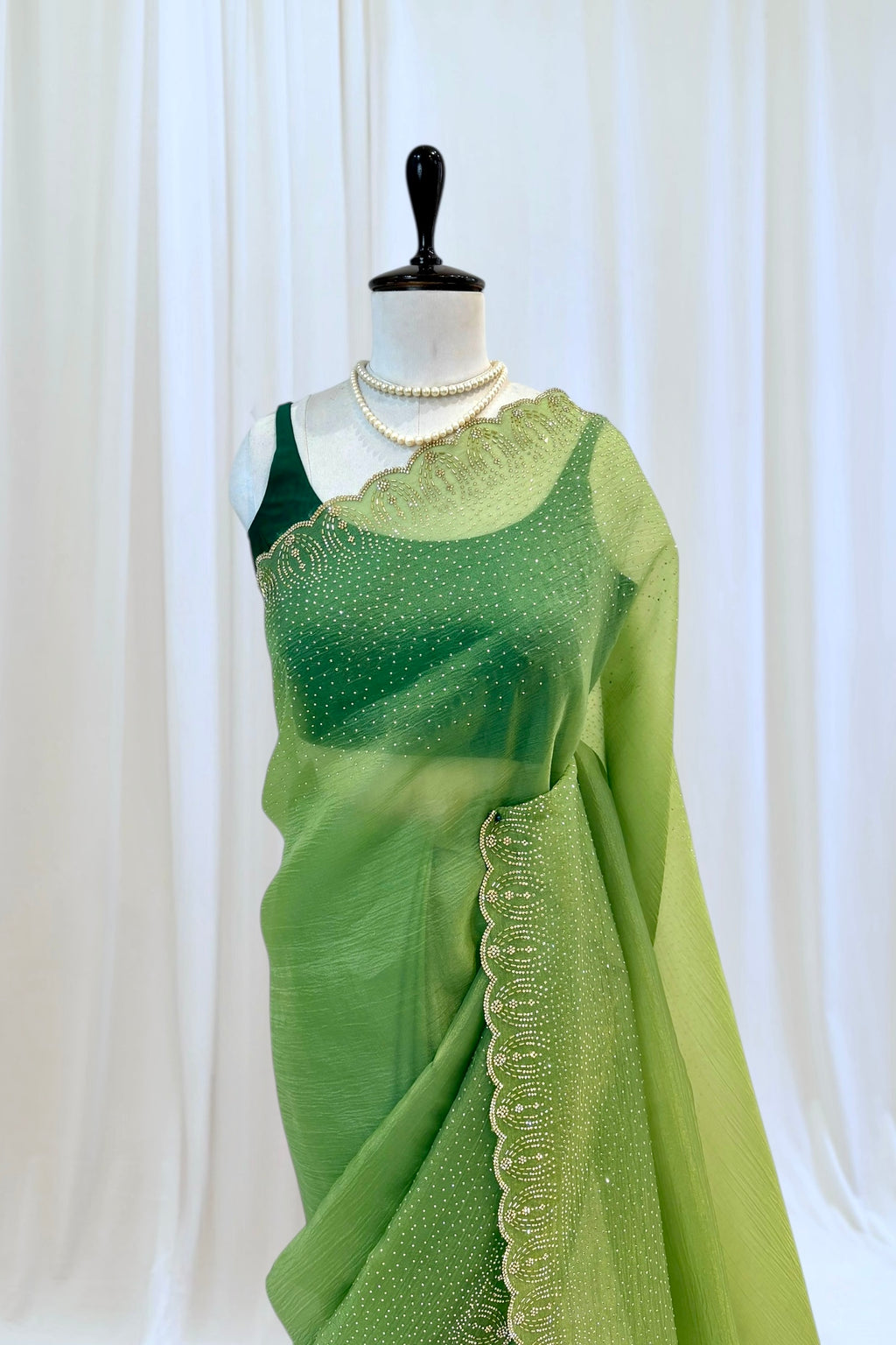 Green organza embellished saree