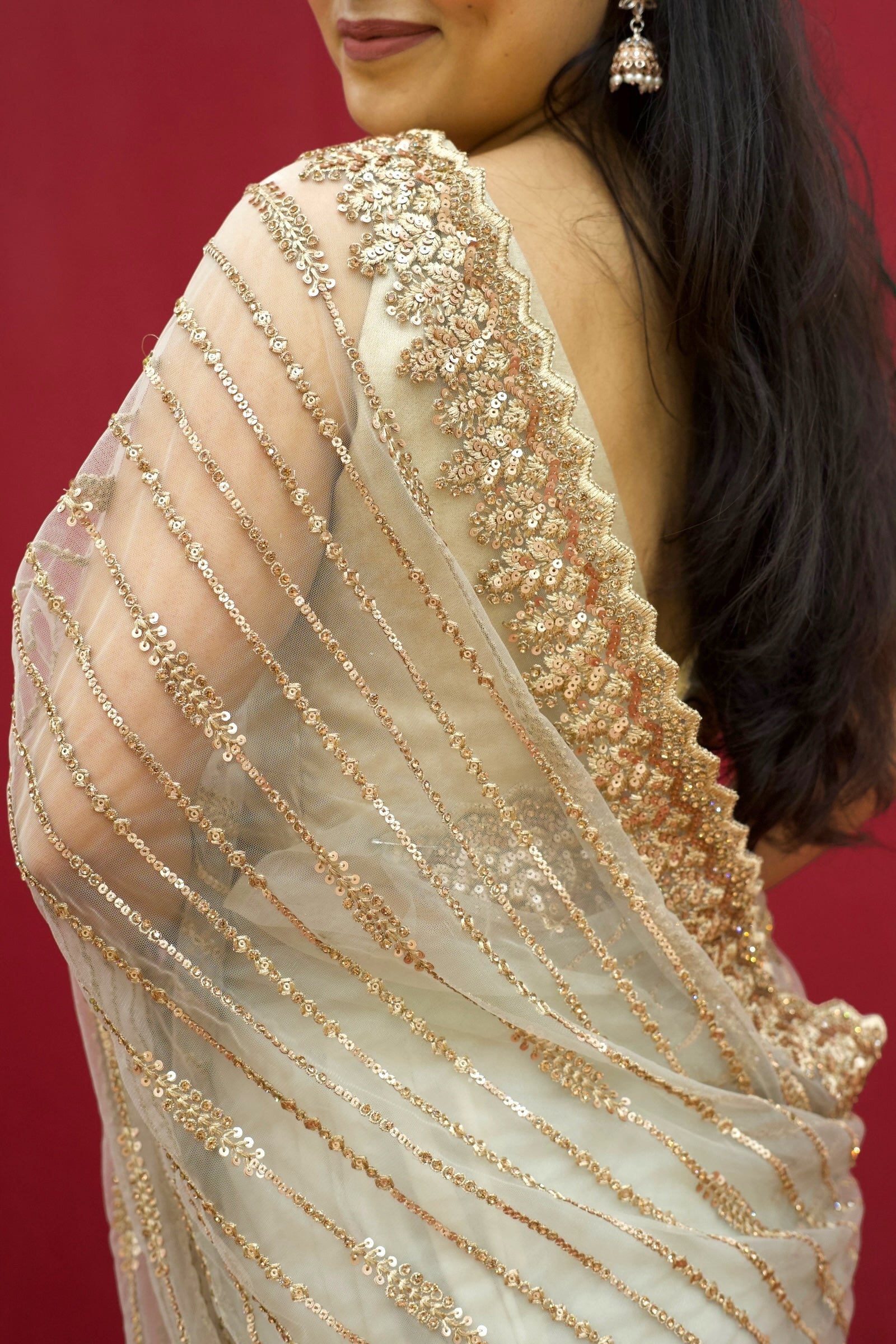 Golden sequins soft net saree - Striped