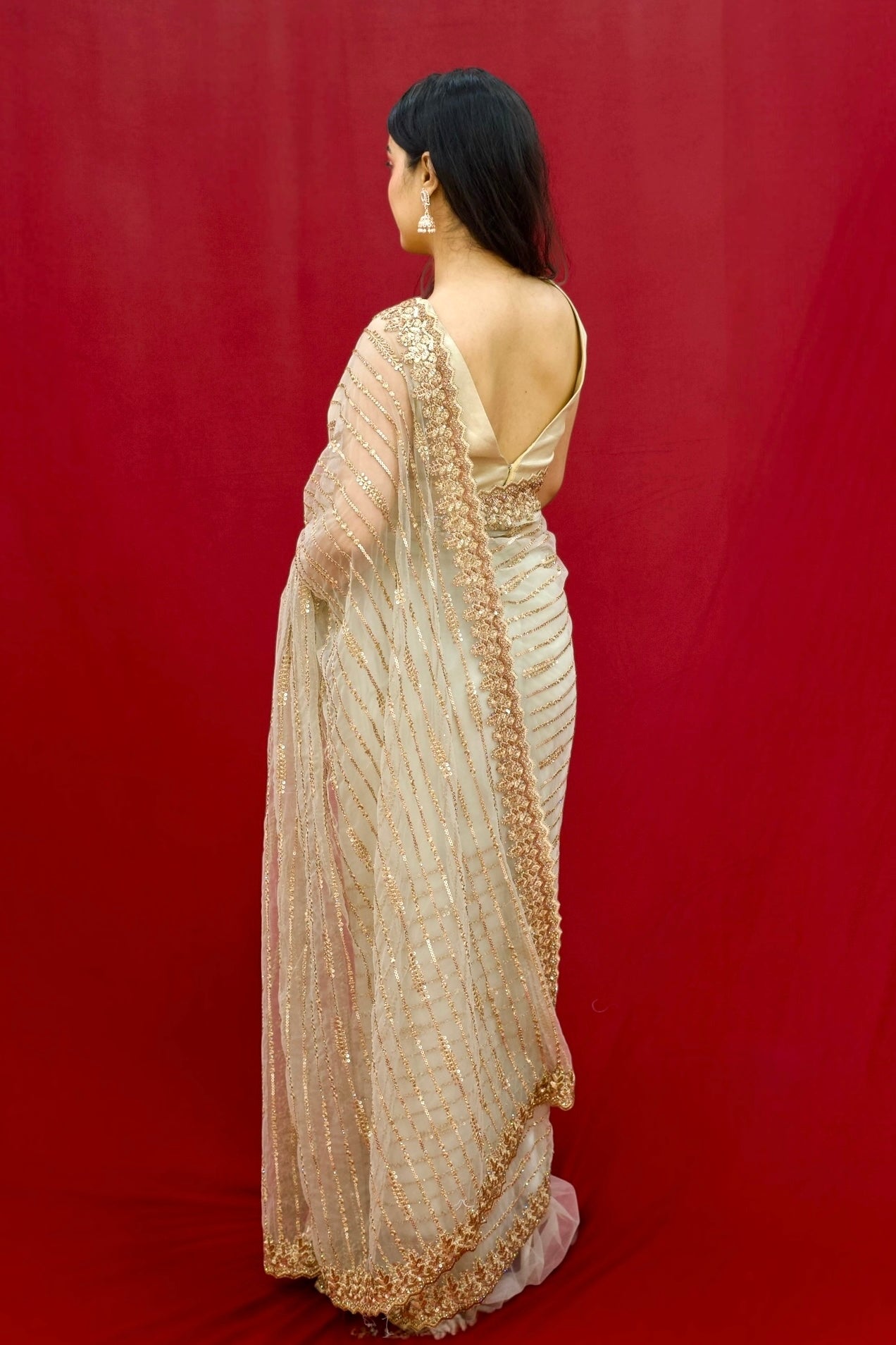 Golden sequins soft net saree - Striped