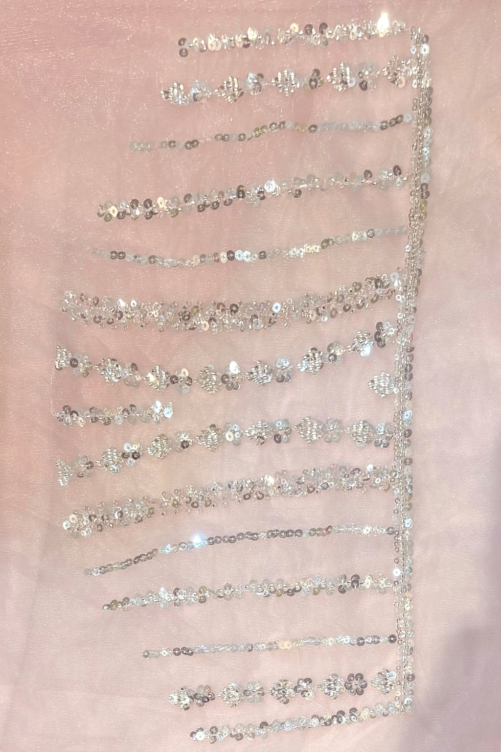 Pink sequins embellished net saree