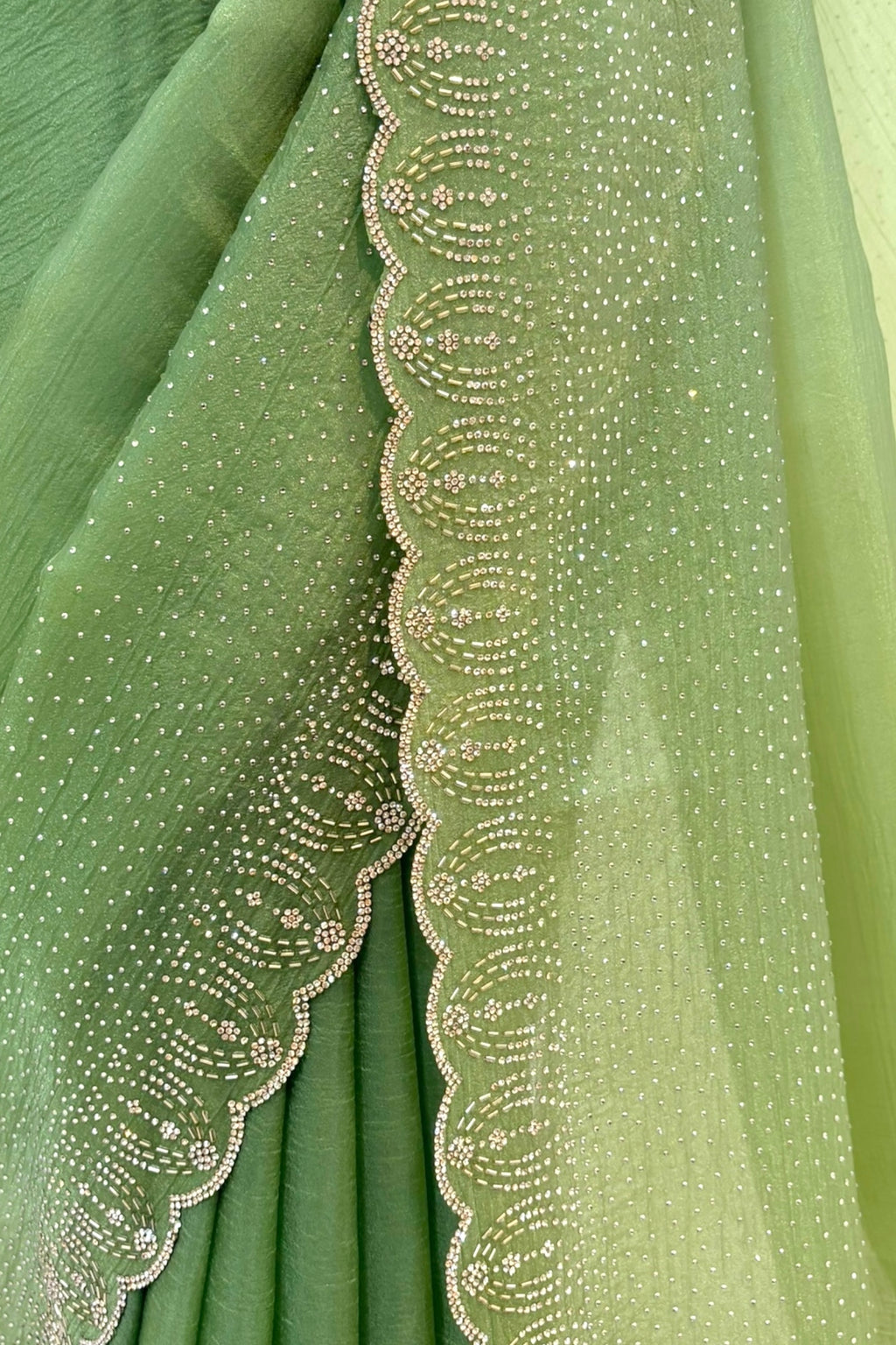 Green organza embellished saree