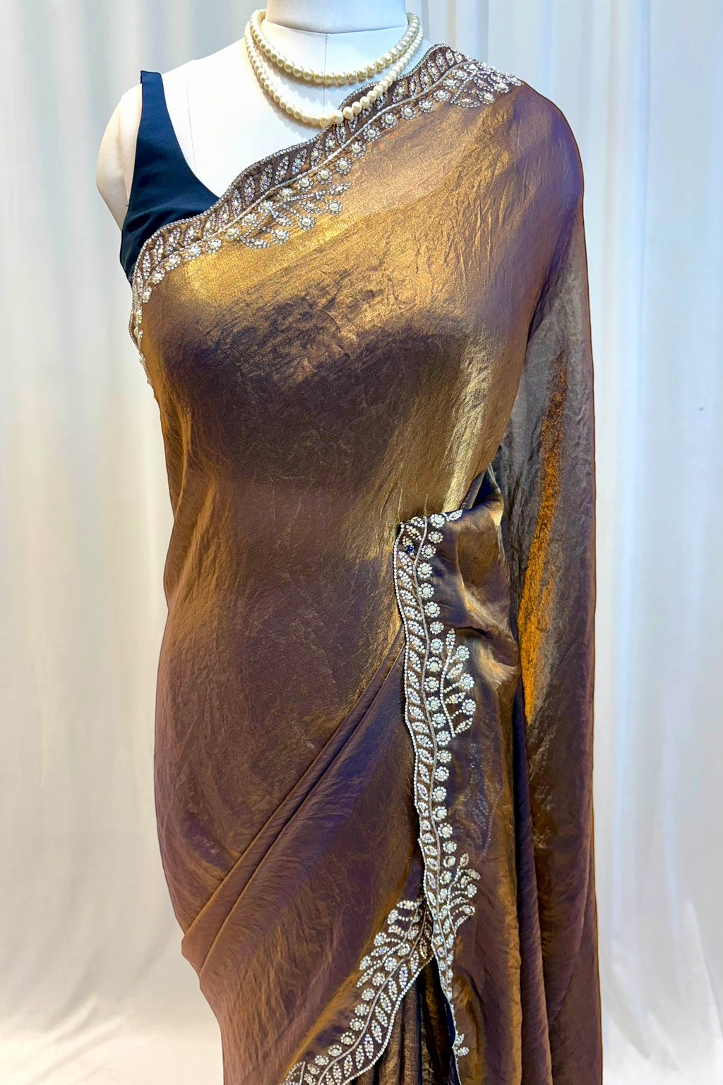 Golden fendy pearl embellished saree