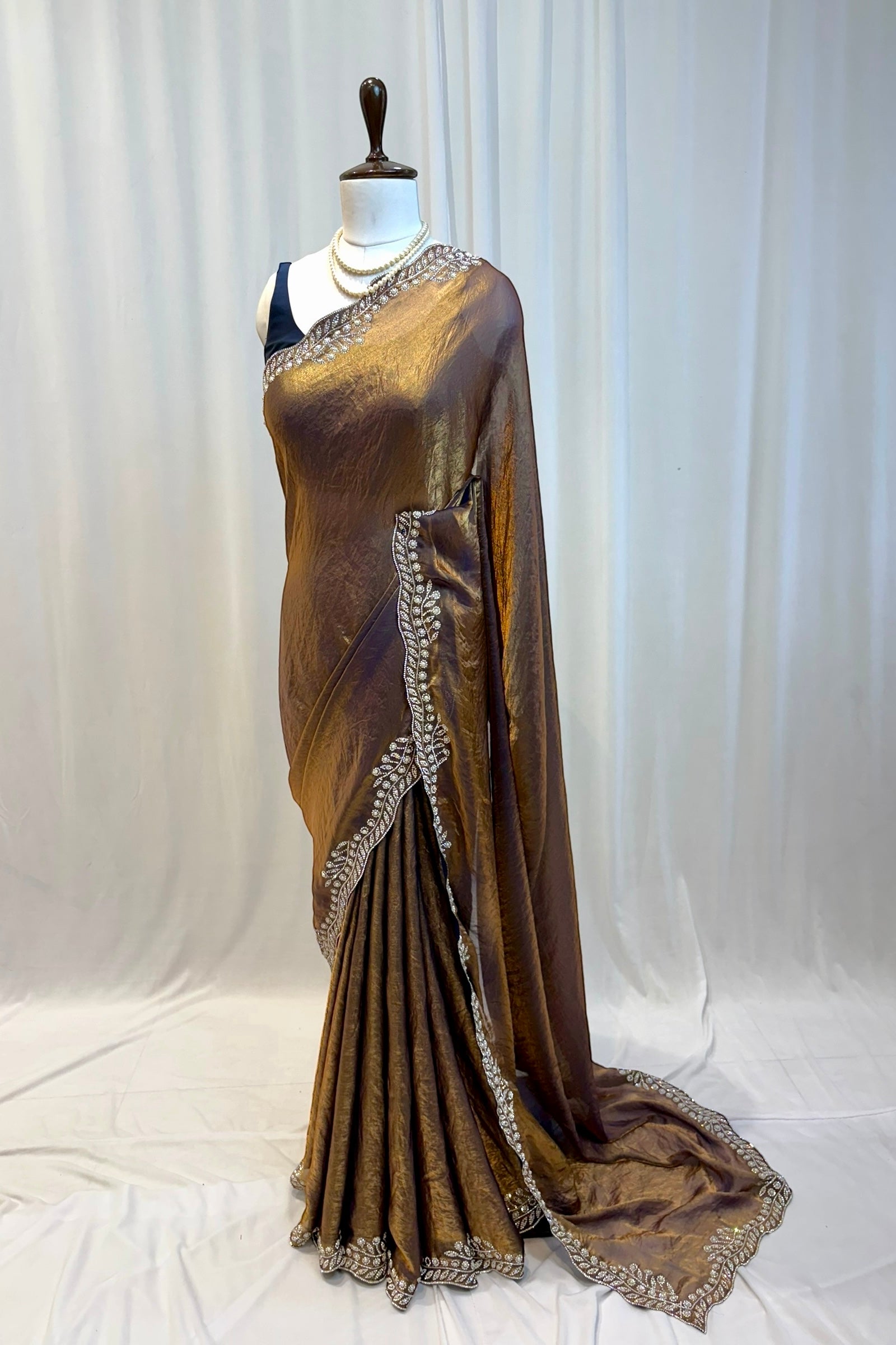 Golden fendy pearl embellished saree