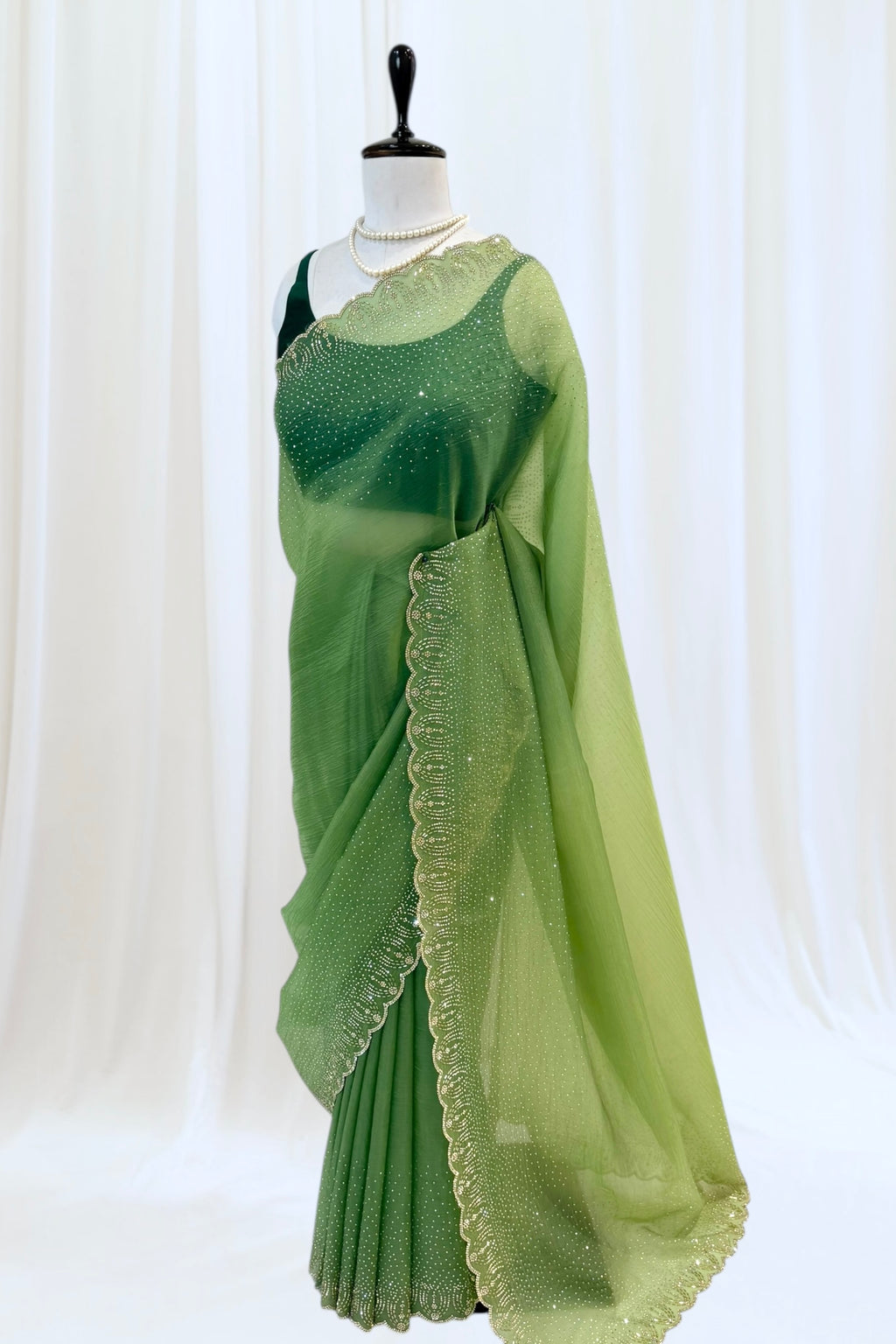 Green organza embellished saree