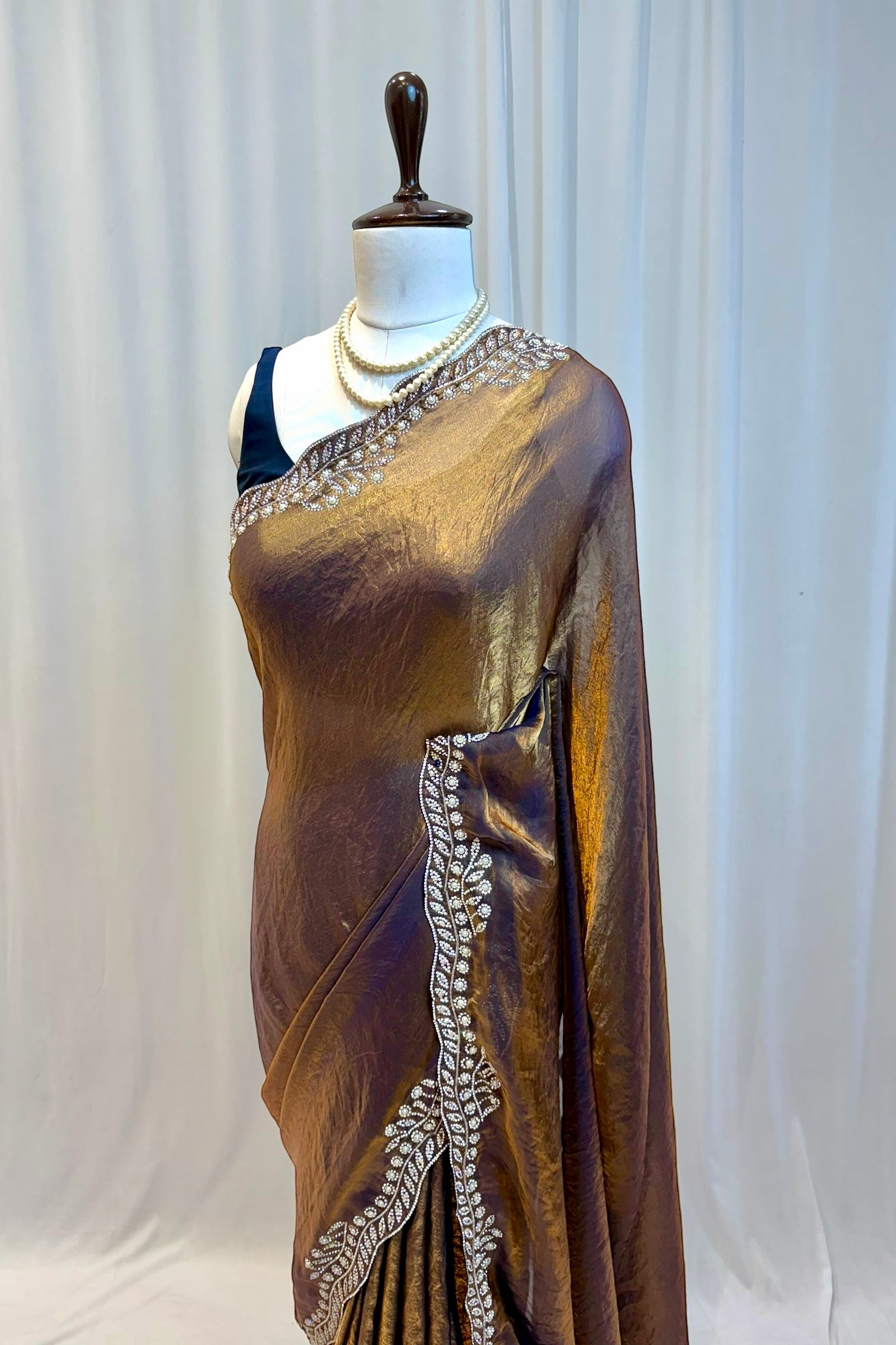 Golden fendy pearl embellished saree