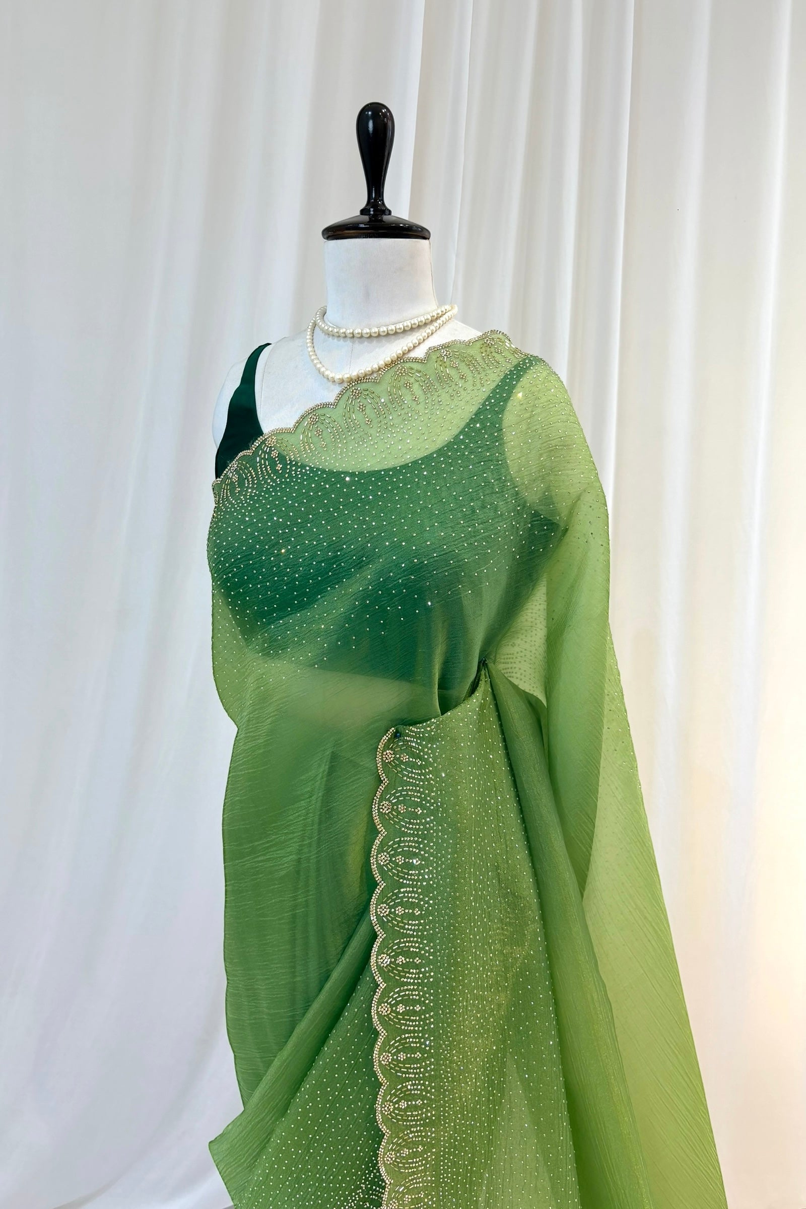 Green organza embellished saree