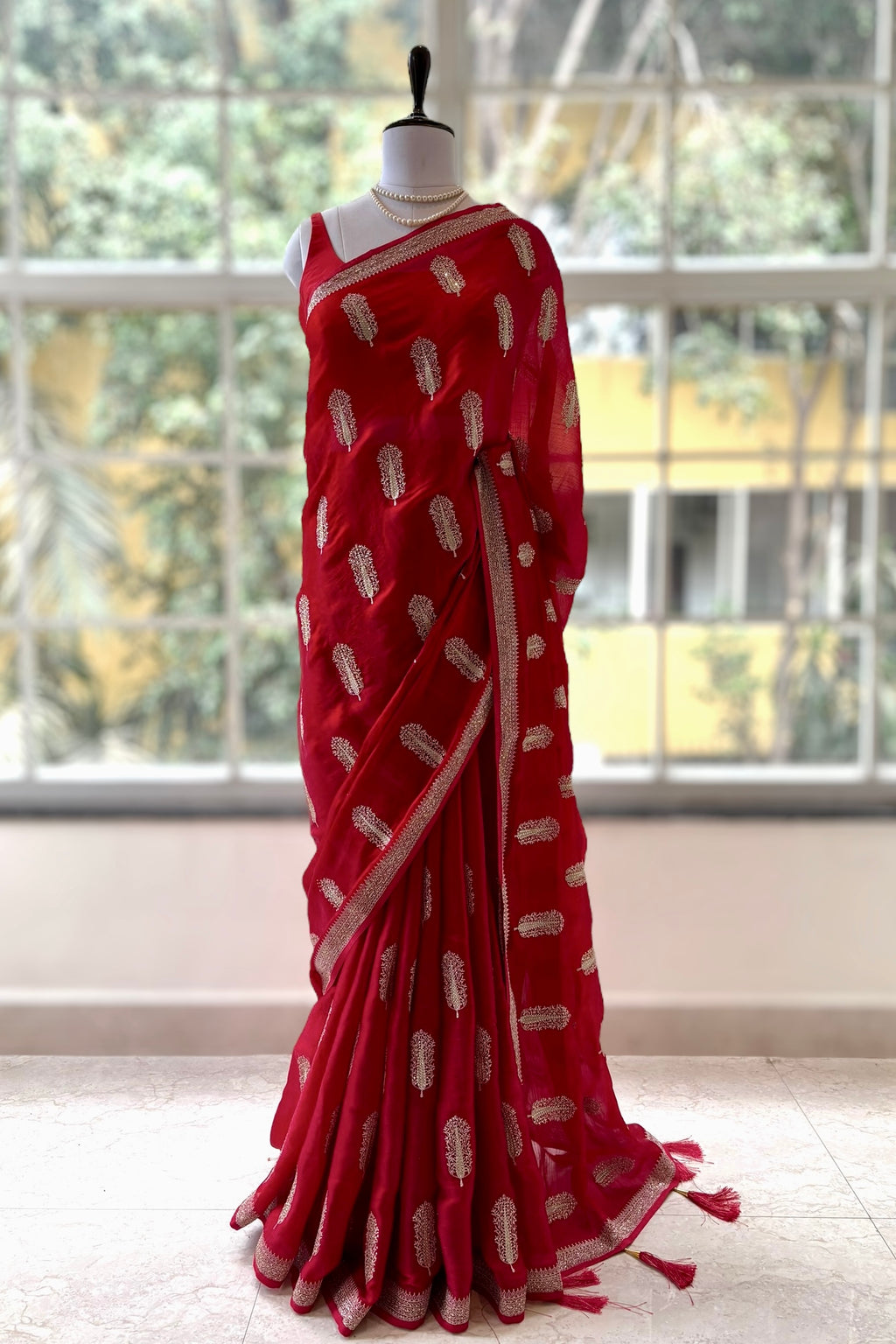 Red embroidered chiffon saree