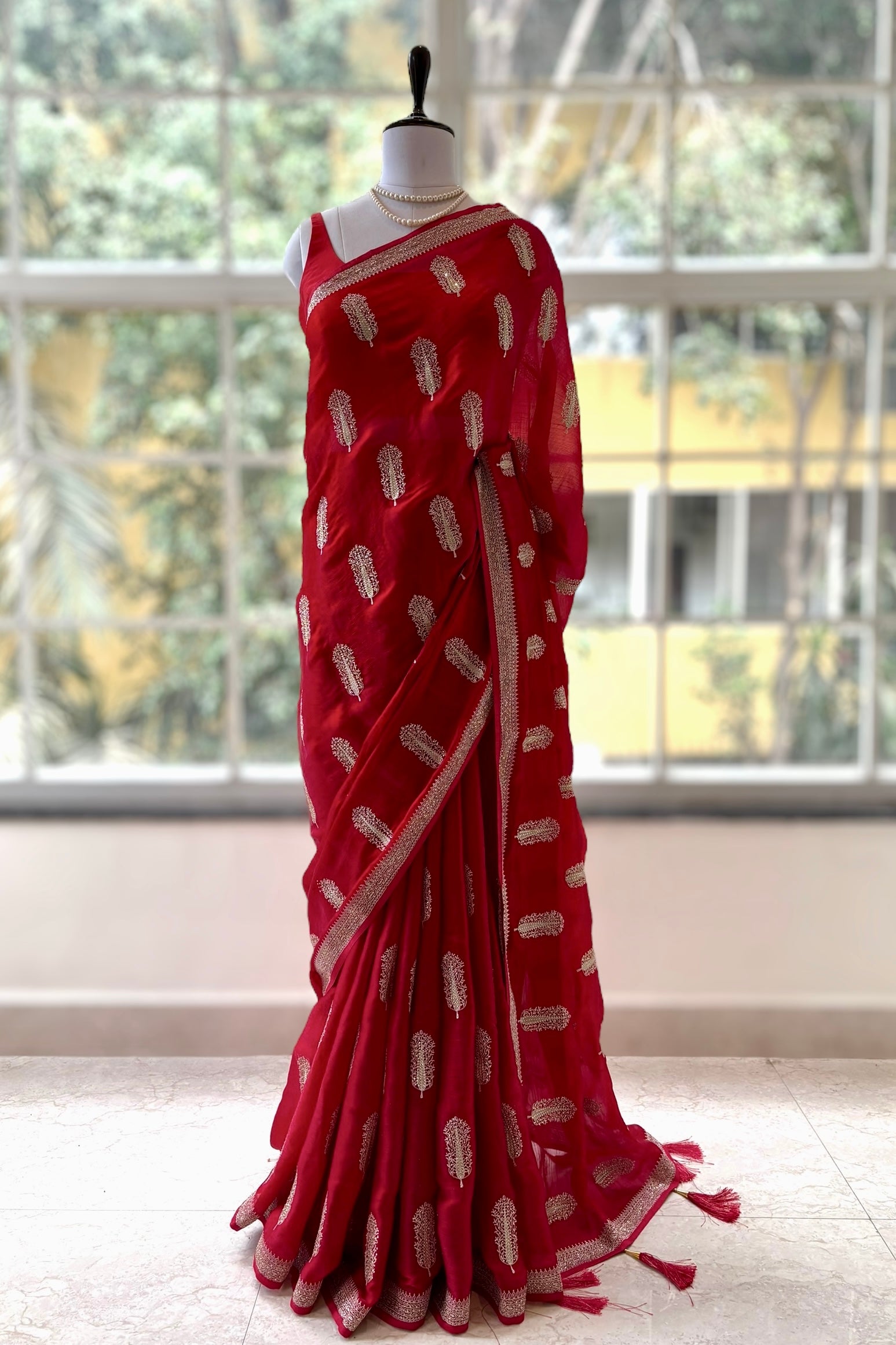 Red embroidered chiffon saree