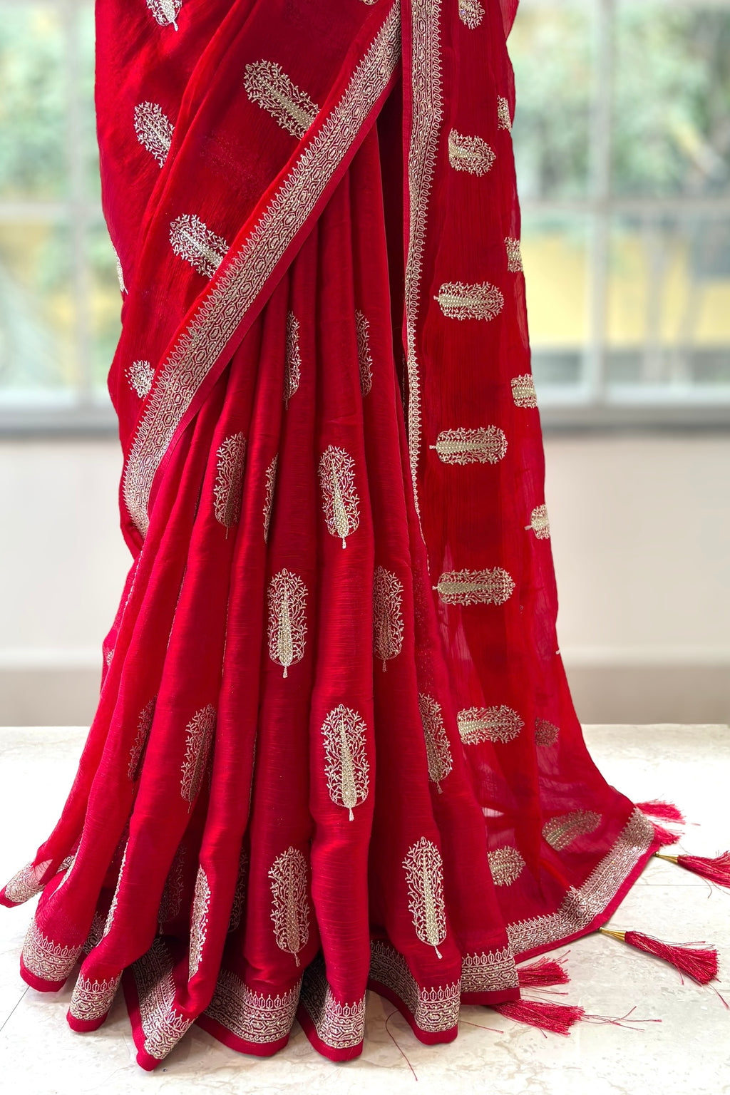 Red embroidered chiffon saree