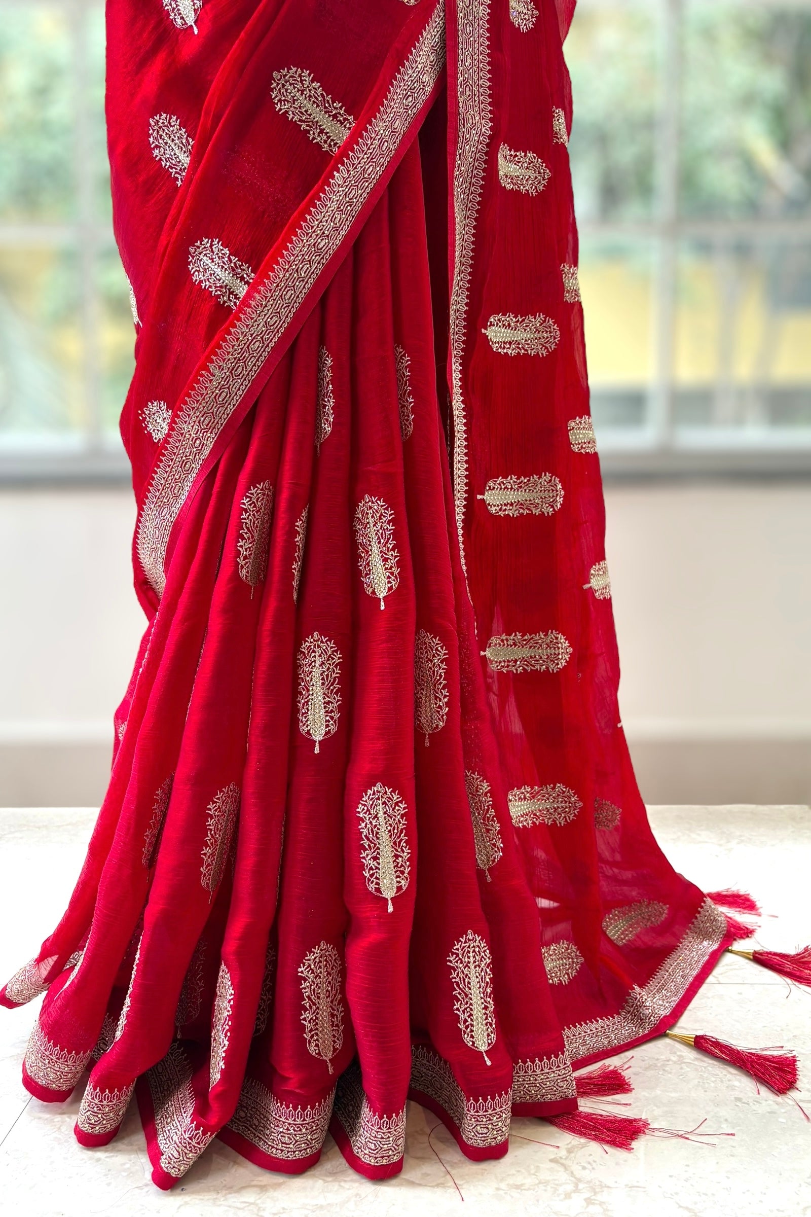 Red embroidered chiffon saree