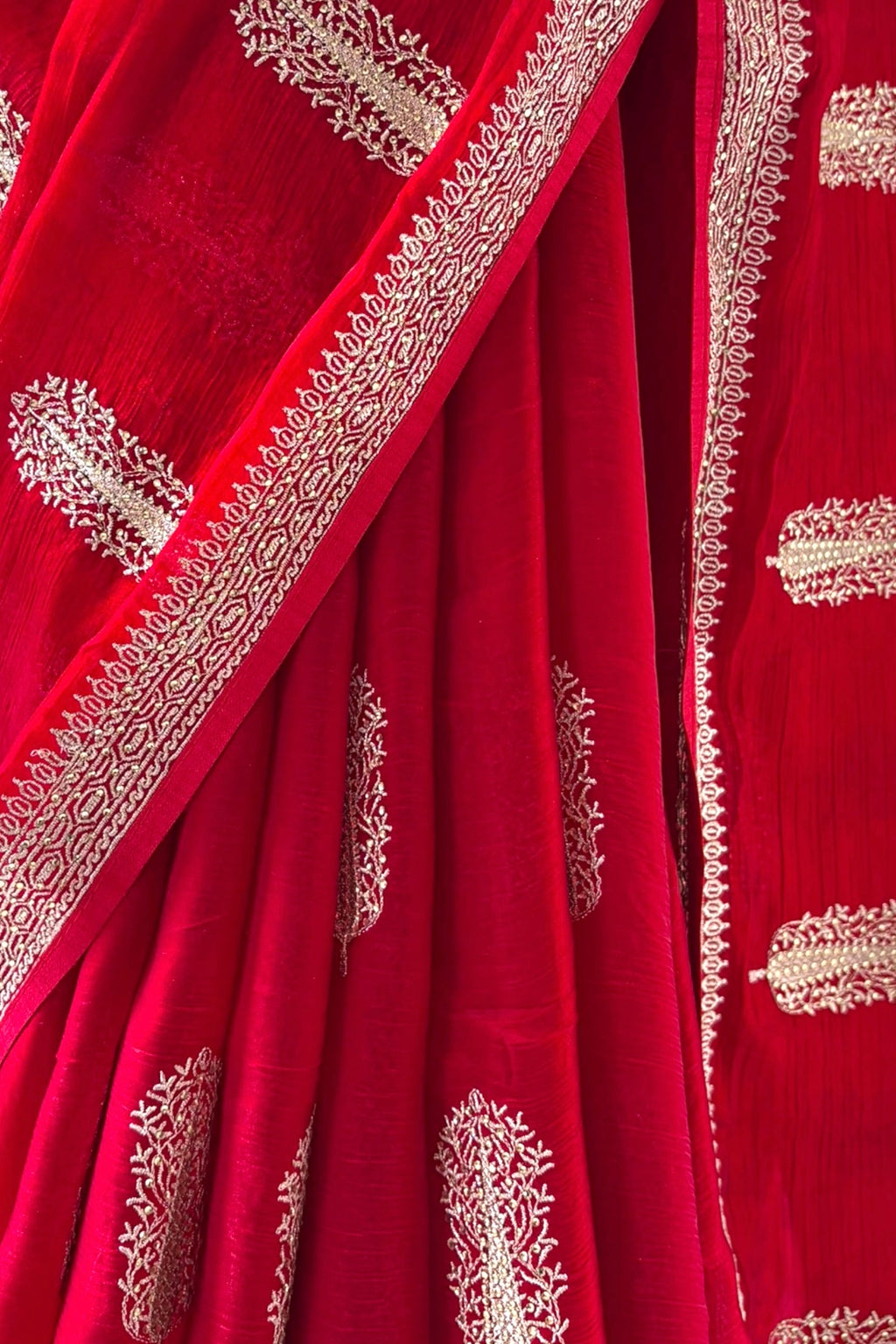 Red embroidered chiffon saree