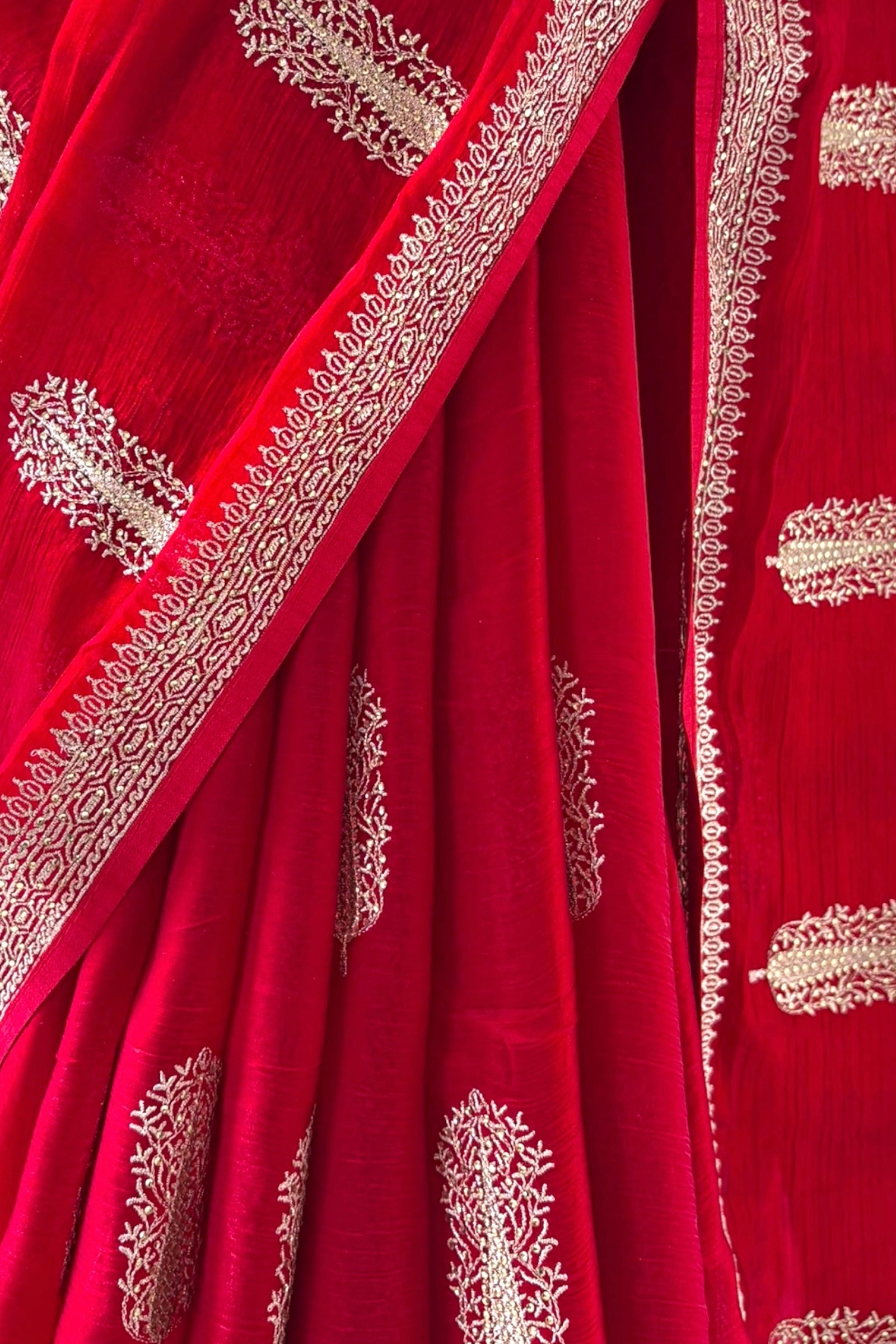 Red embroidered chiffon saree