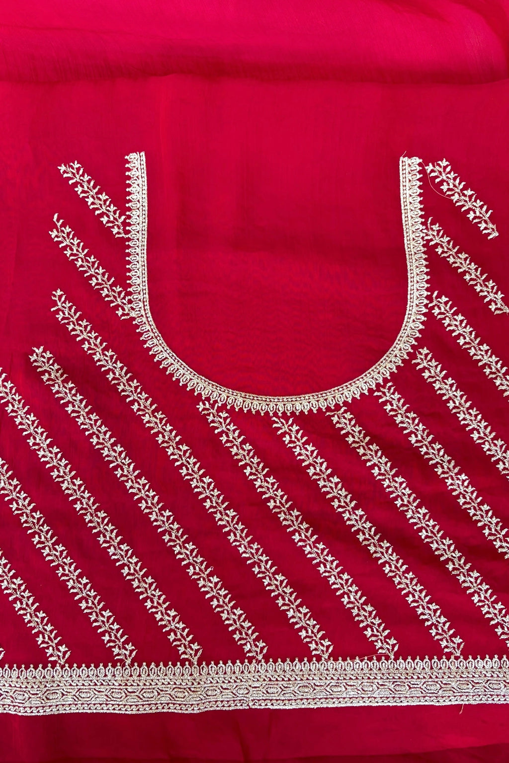 Red embroidered chiffon saree