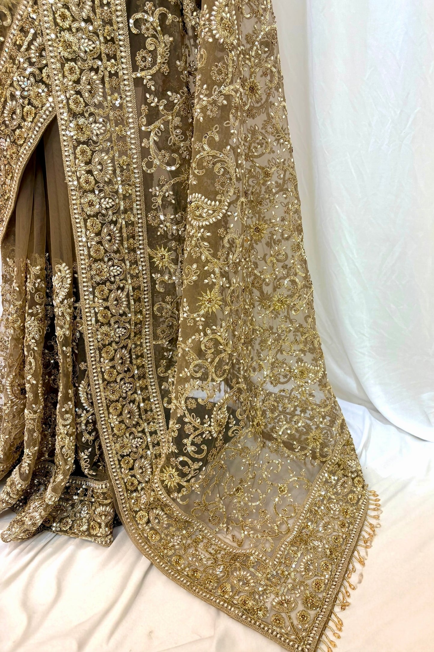 Golden embellished net saree