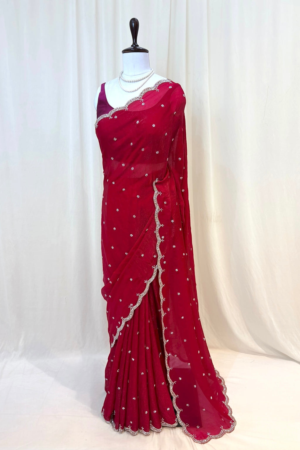 Crimson fendy cutwork saree