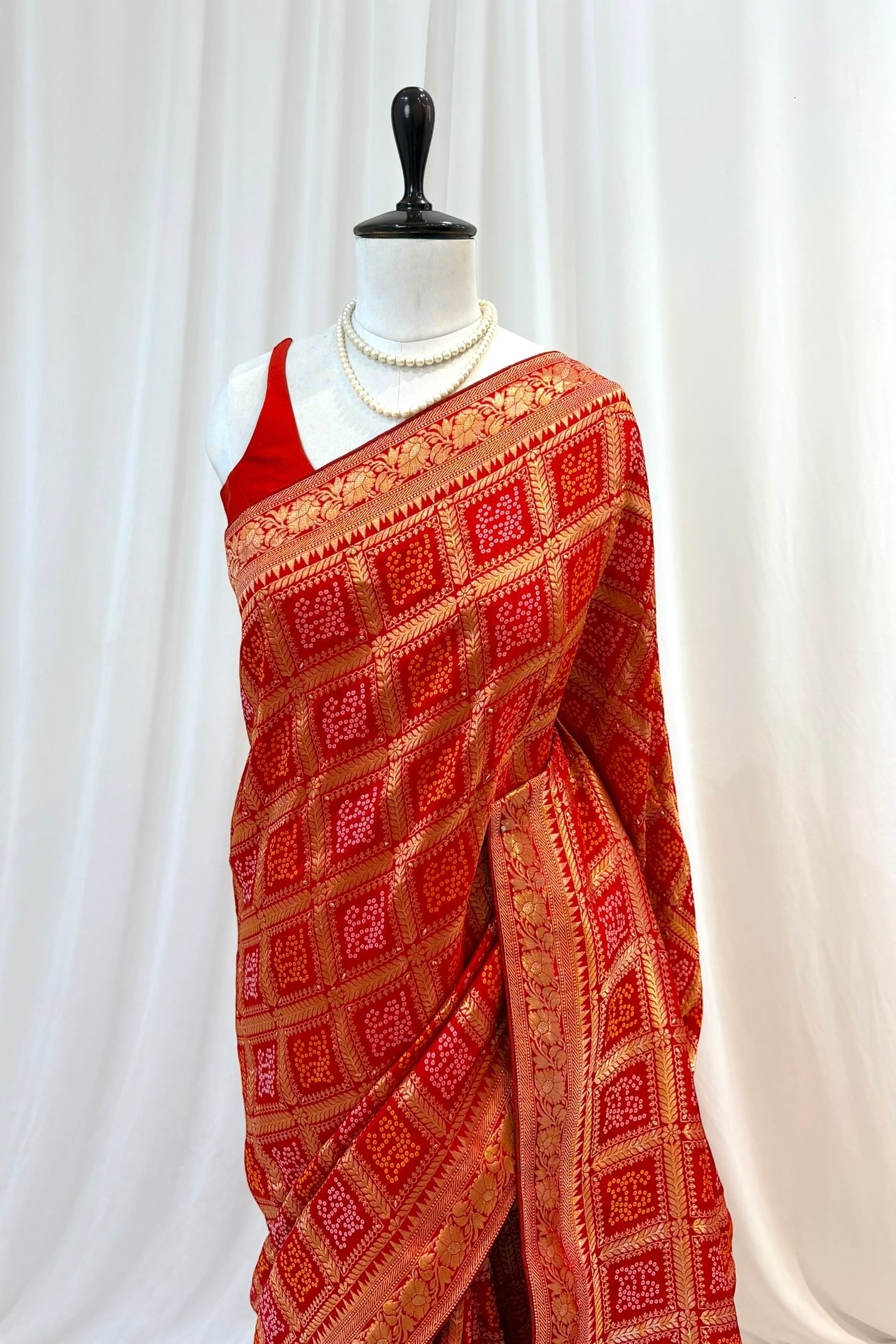 Red zari bandhani saree