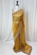 Yellow soft organza embellished saree