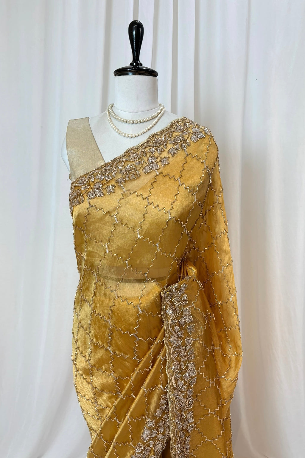 Yellow soft organza embellished saree