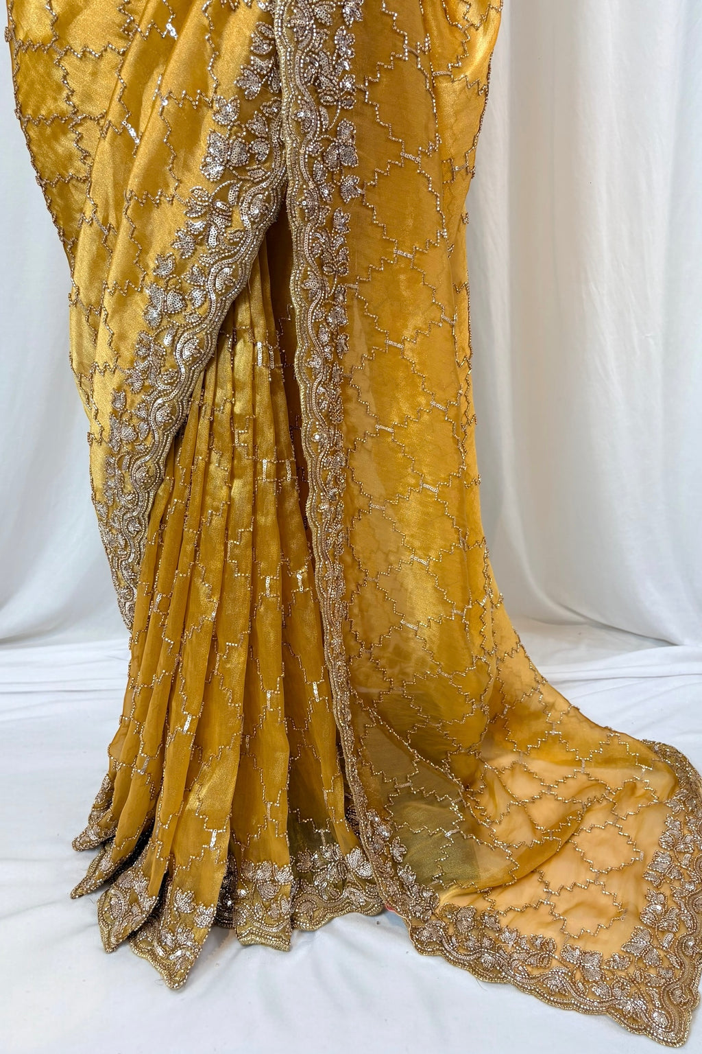 Yellow soft organza embellished saree