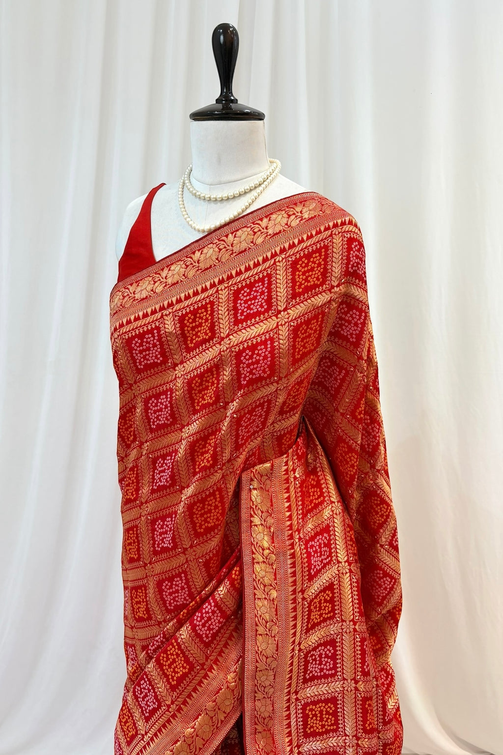 Red zari bandhani saree