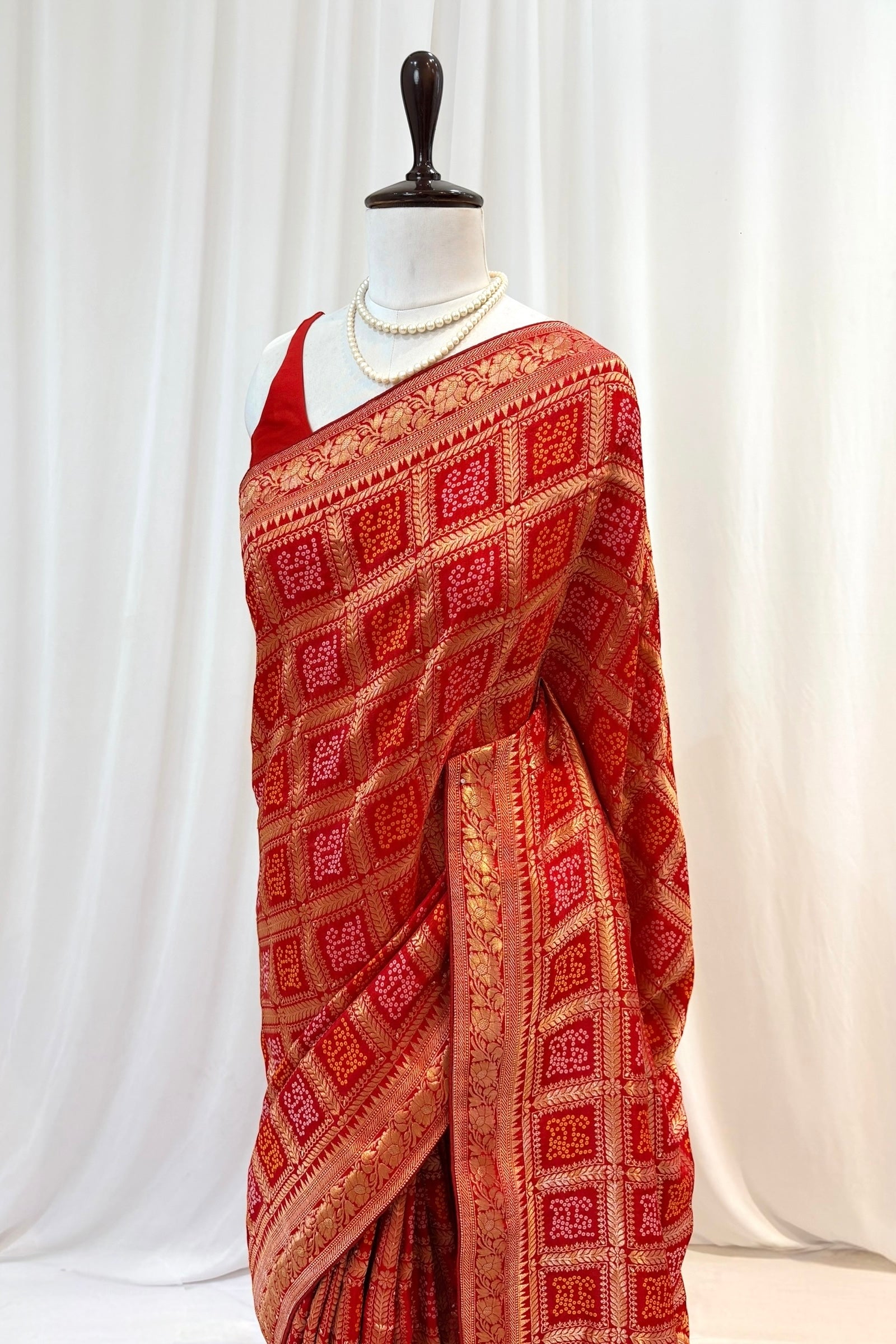 Red zari bandhani saree