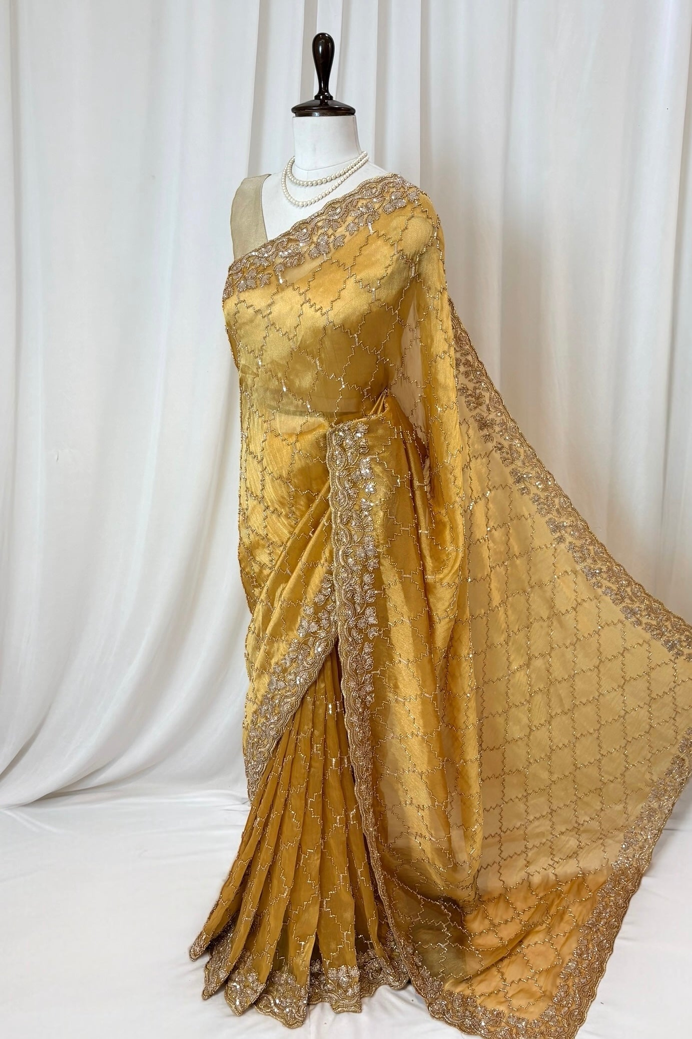 Yellow soft organza embellished saree