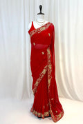 Red georgette zari embellished saree