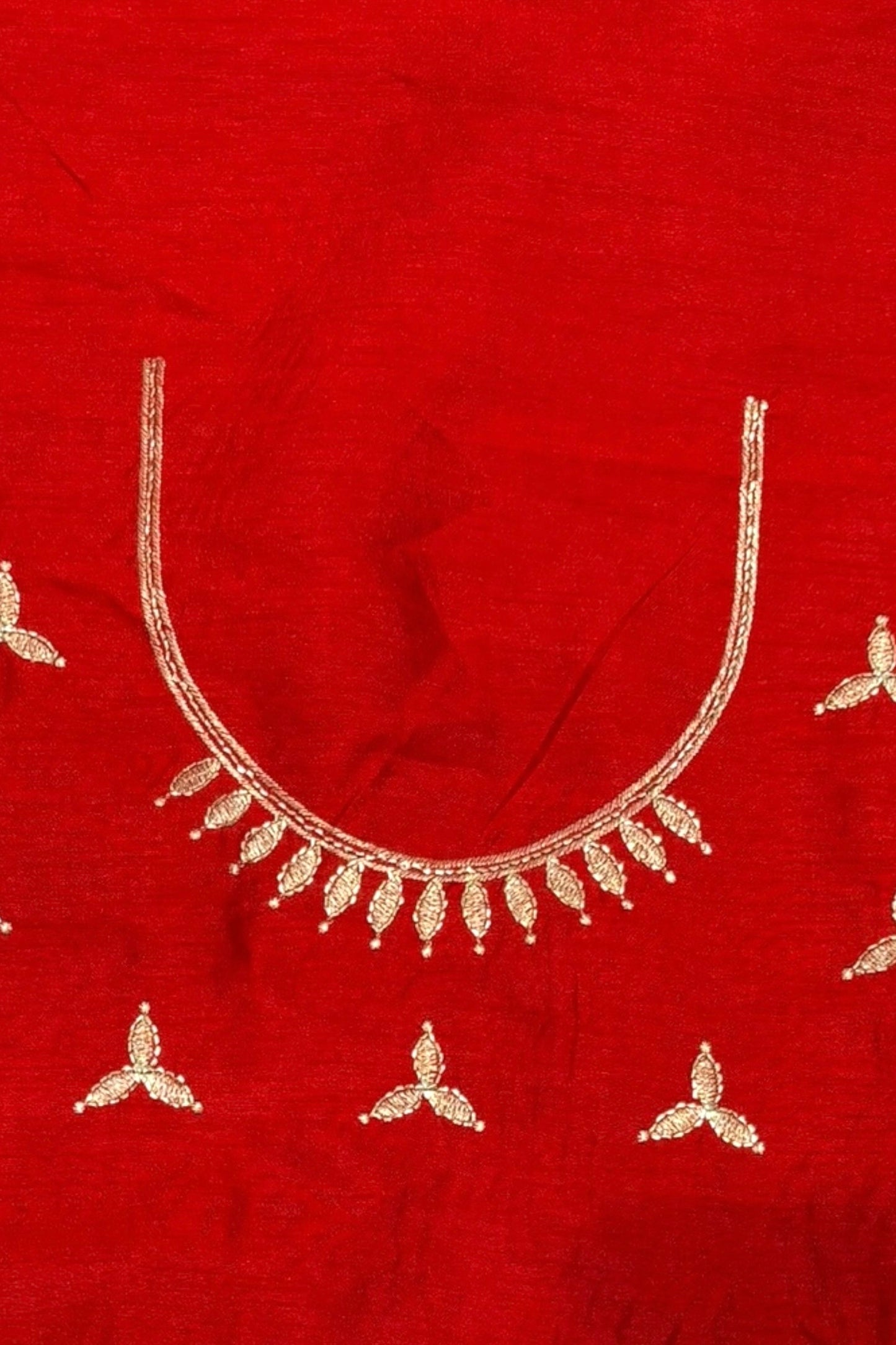 Red georgette zari embellished saree