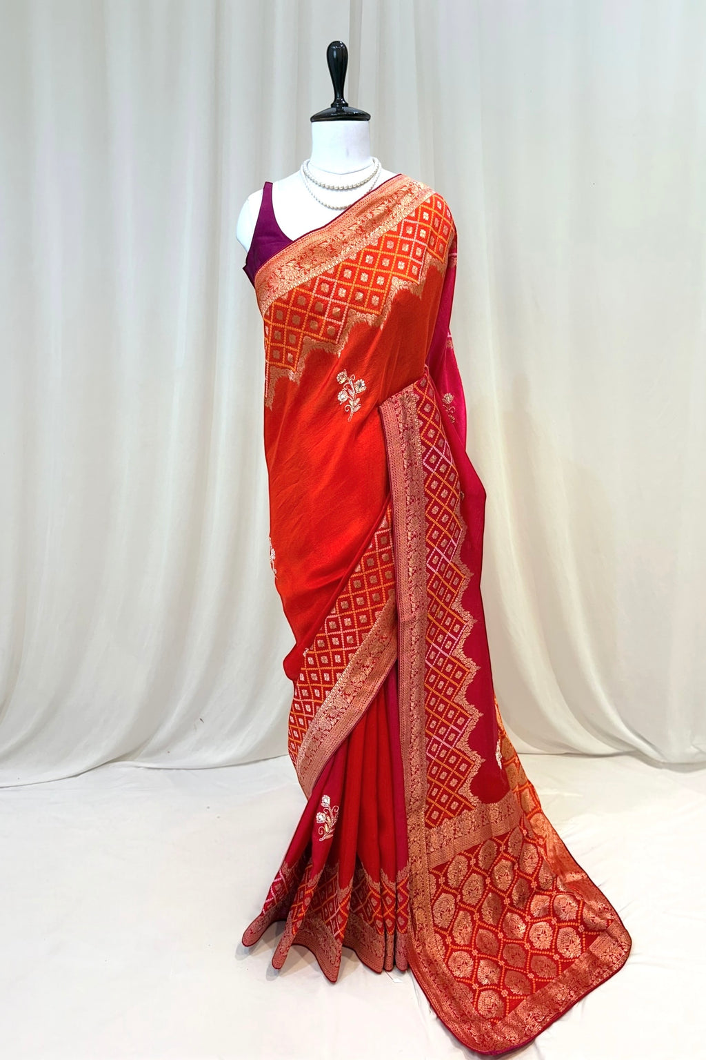 Orange-pink shaded pure dola silk saree