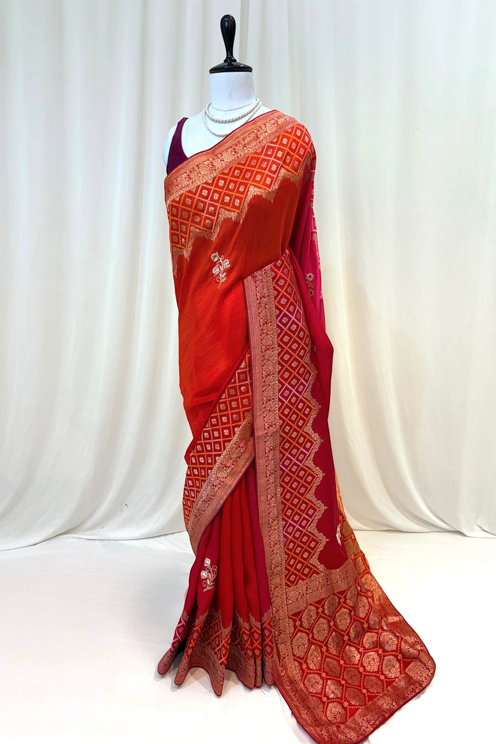 Orange-pink shaded pure dola silk saree