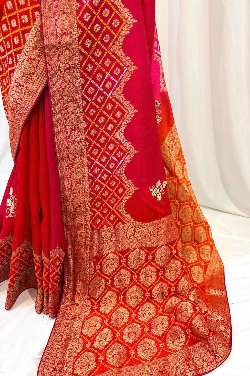 Orange-pink shaded pure dola silk saree