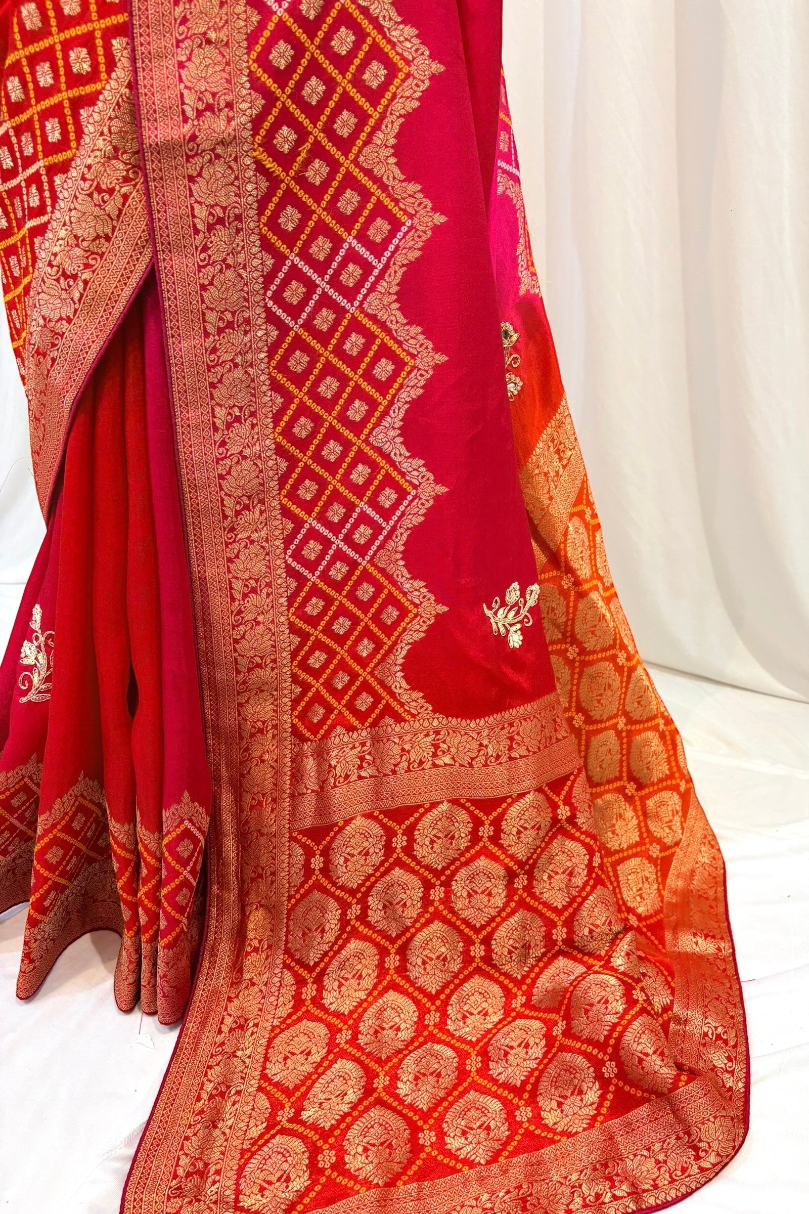 Orange-pink shaded pure dola silk saree