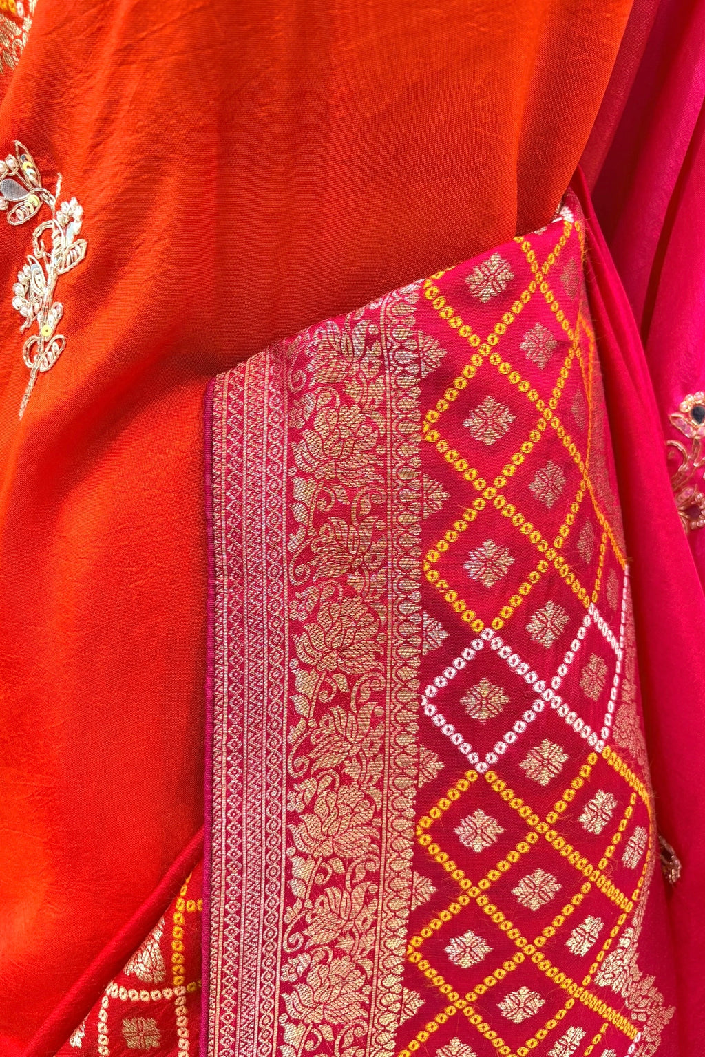 Orange-pink shaded pure dola silk saree