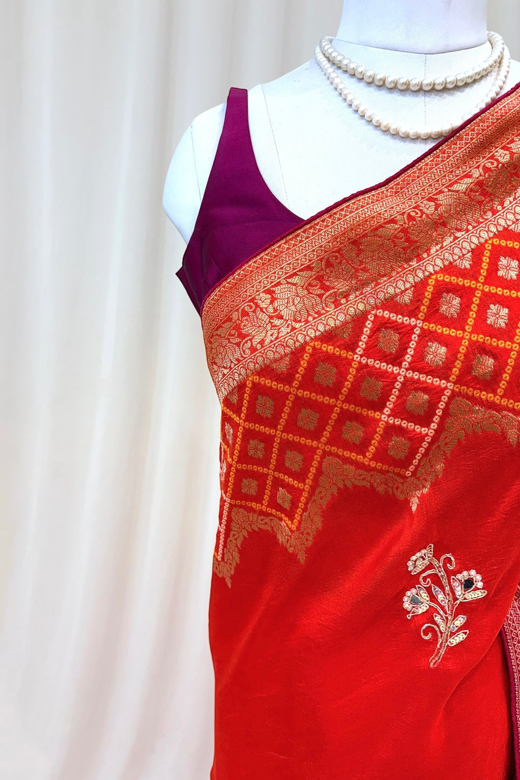 Orange-pink shaded pure dola silk saree